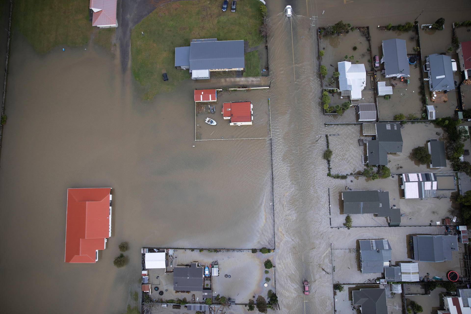 A flooded Westport, pictured on July 18. Hundreds of homes have been yellow-stickered from flood damage. Photo / George Heard