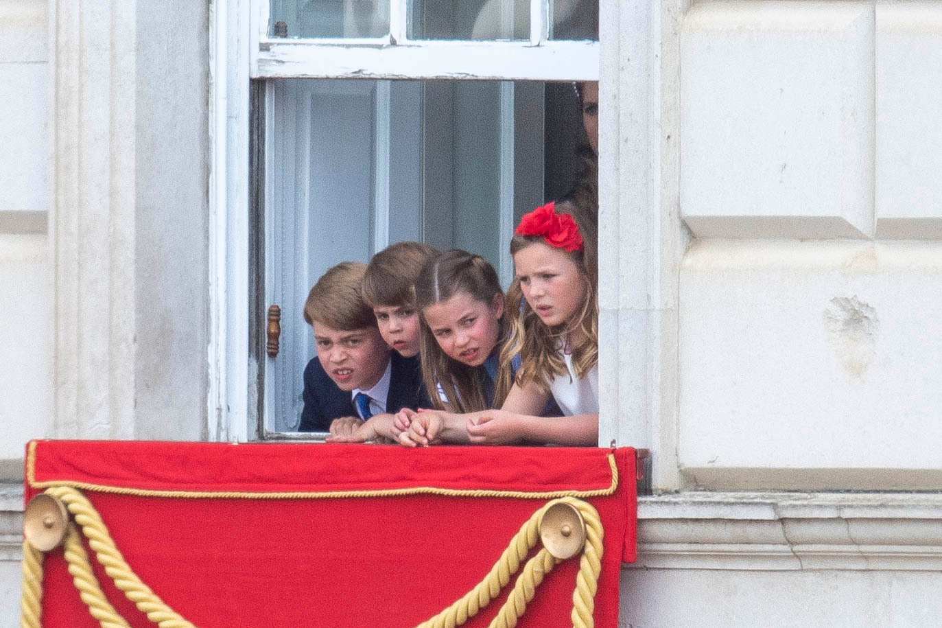 From left, Prince George, Prince Louis, Princess Charlotte and Mia Tindell watch the Trooping the Colour in London. Photo / AP