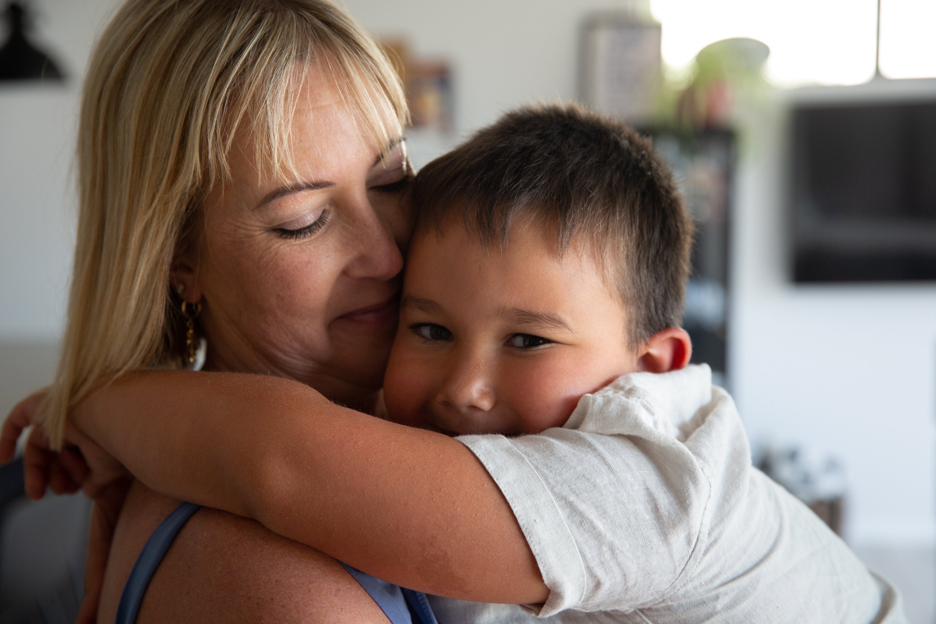 Nicky Beatson and her son Kaden Brown, 5, who has hydrocephalus, pictured at their home in Mangawhai. Kaden suffered a brain bleed at birth due to a ventouse delivery. Photo / Sylvie Whinray