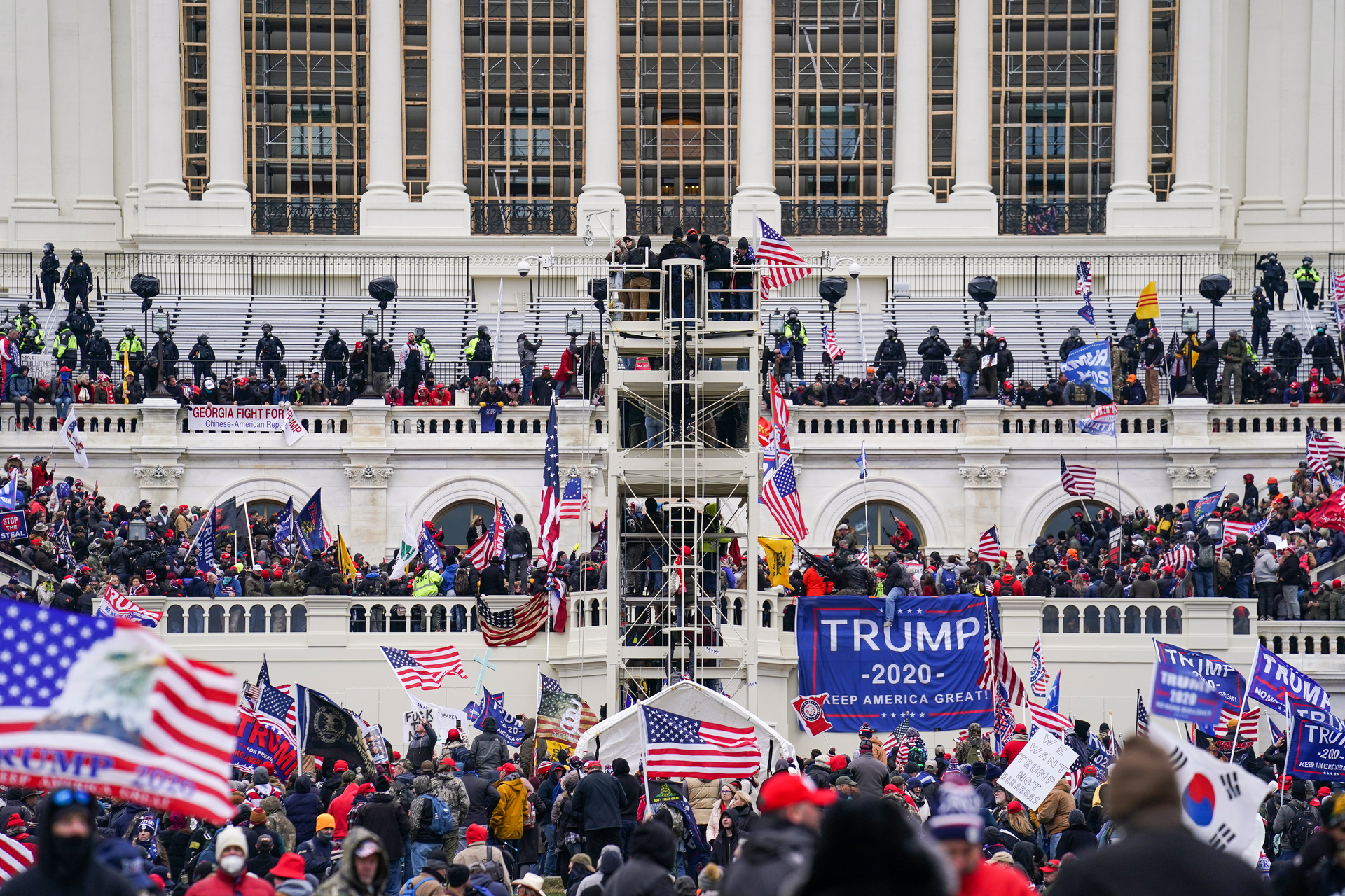 Trump supporters gather outside the Capitol on Thursday. Photo / AP