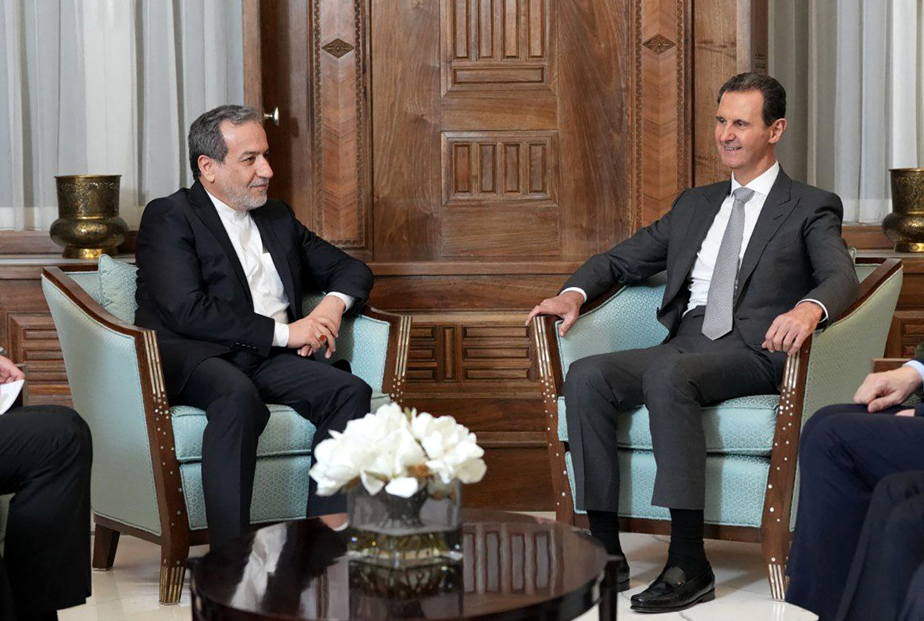 Iran's Foreign Minister Abbas Araghchi (left) meeting Syrian President Bashar al-Assad in Damascus. Photo / AFP