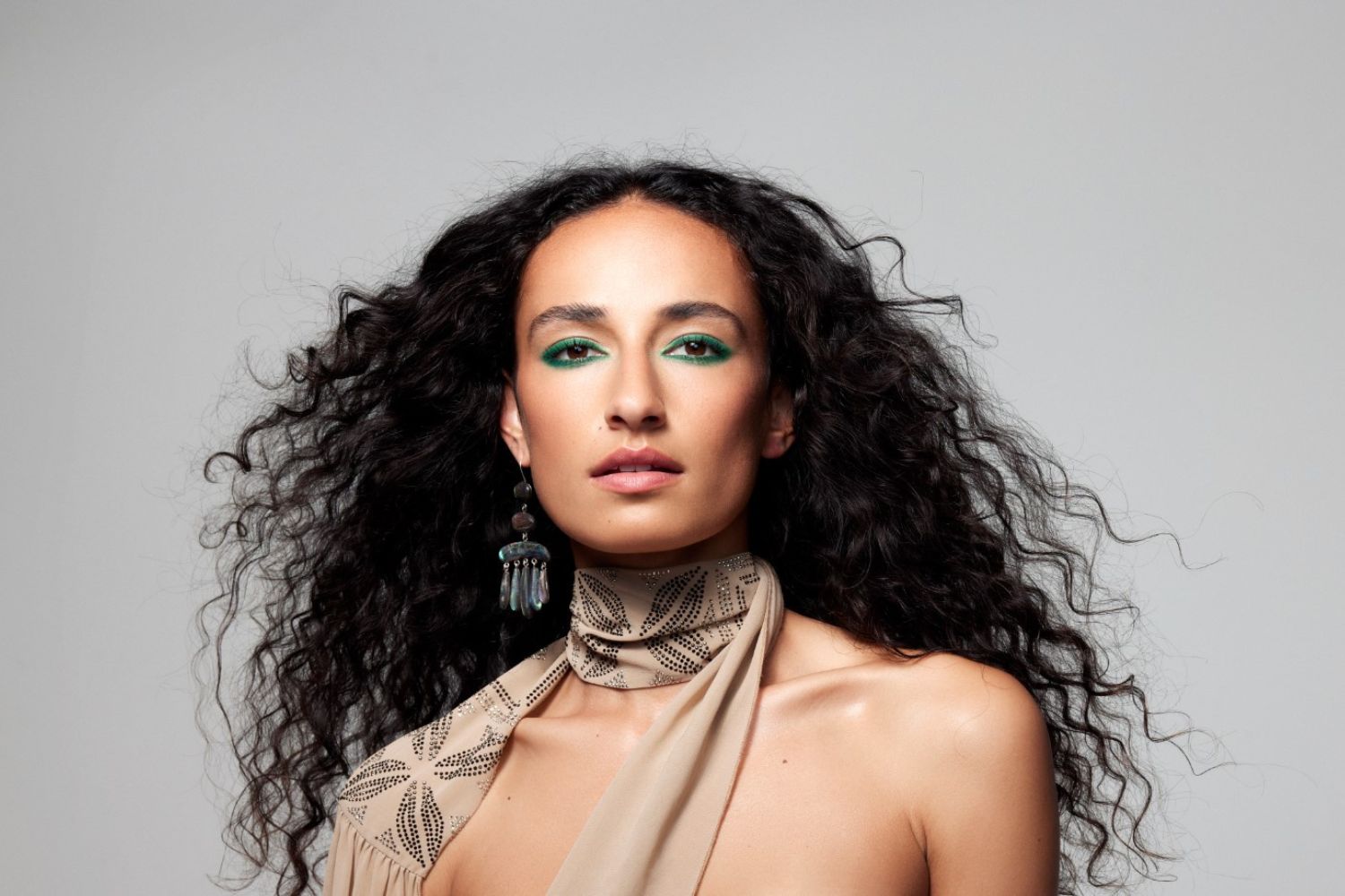 Alaina wears Jennifer Laracy pāua shell earring, courtesy of Season Gallery. Liz Mitchell archival scarf. Photo / Guy Coombes