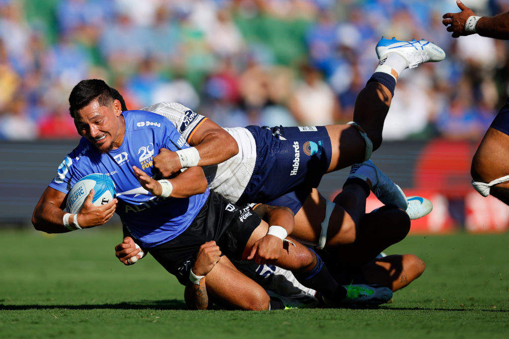 Sio Tomkinson of the Force gets tackled against Moana Pasifika. Photo / Getty Images