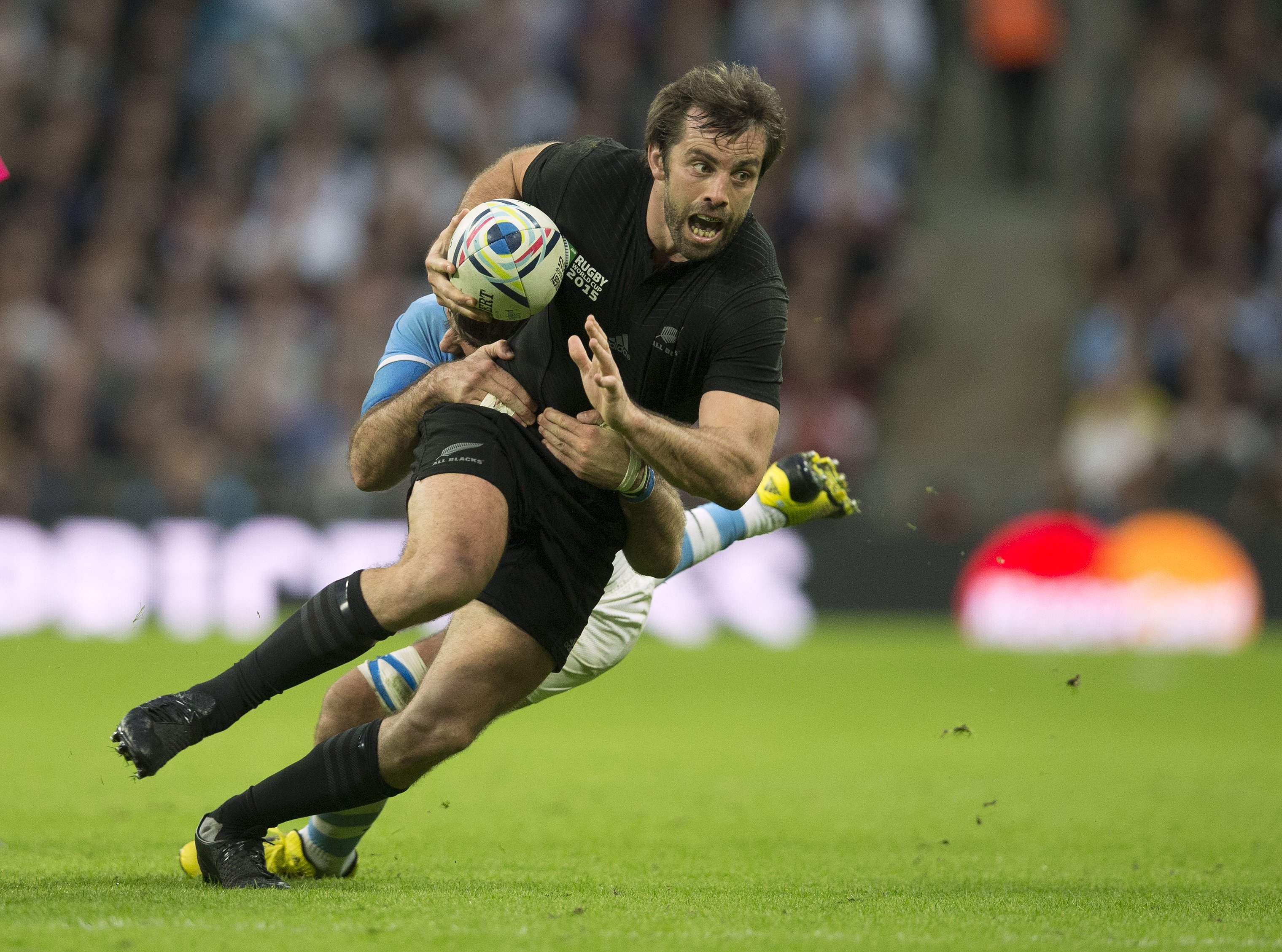 All Blacks centre Conrad Smith on the charge during his final Rugby World Cup campaign, in 2015. Photo / Brett Phibbs