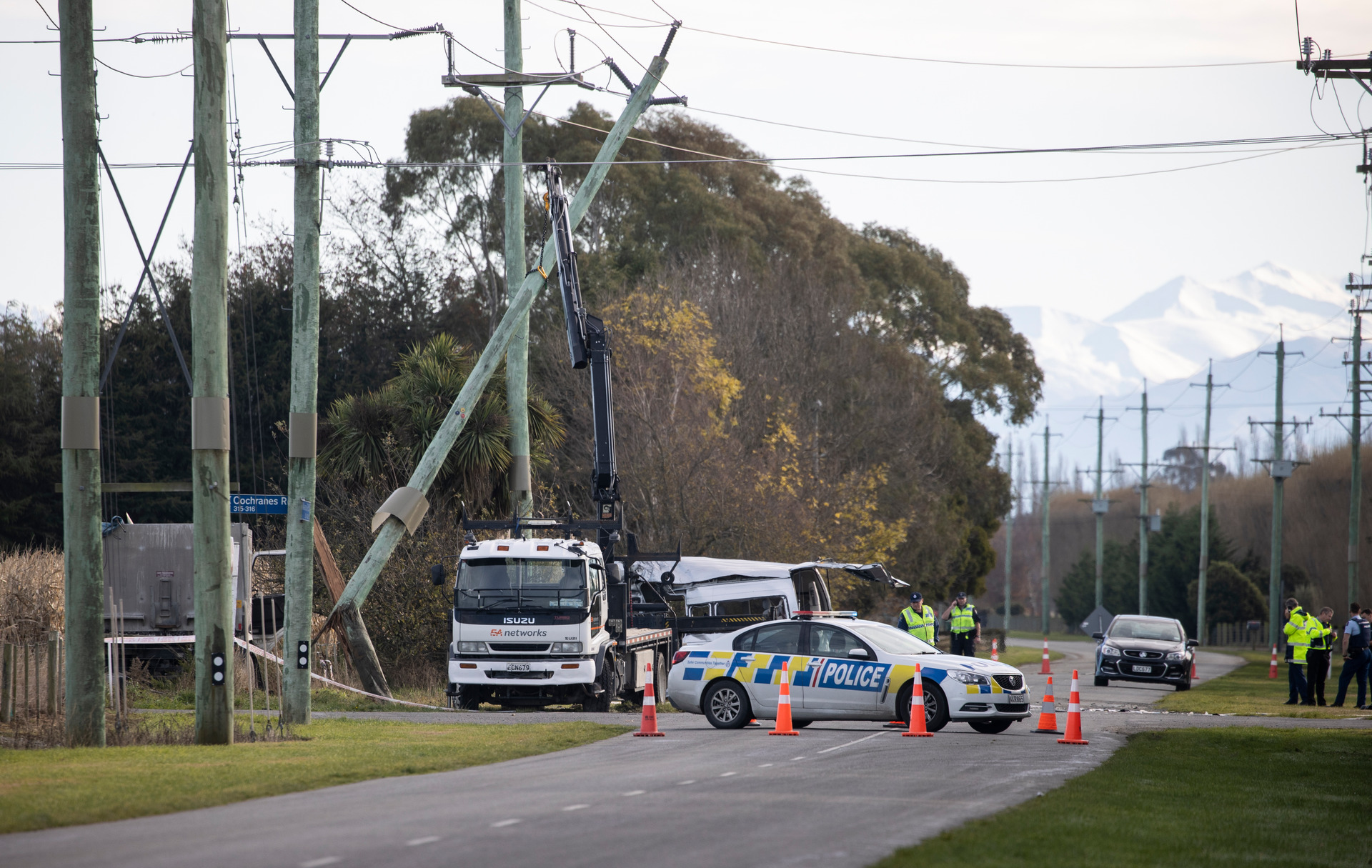 Four people died yesterday morning in Ashburton after a crash between a van and a truck. Photo / George Heard