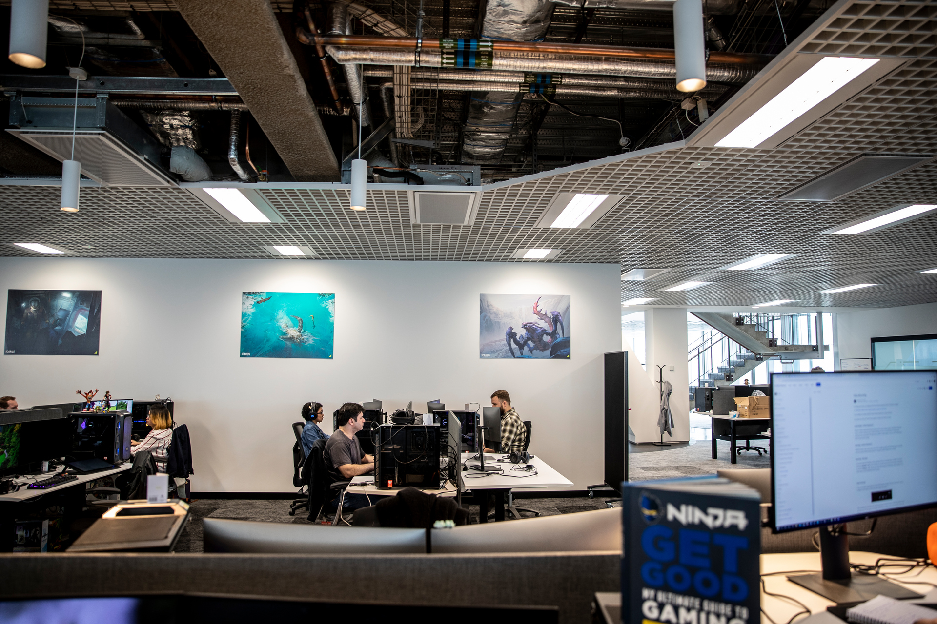 Rocketwerkz staff in its office at Commercial Bay, where it has the top floor and penthouse in the new PwC Tower. Photo / Michael Craig