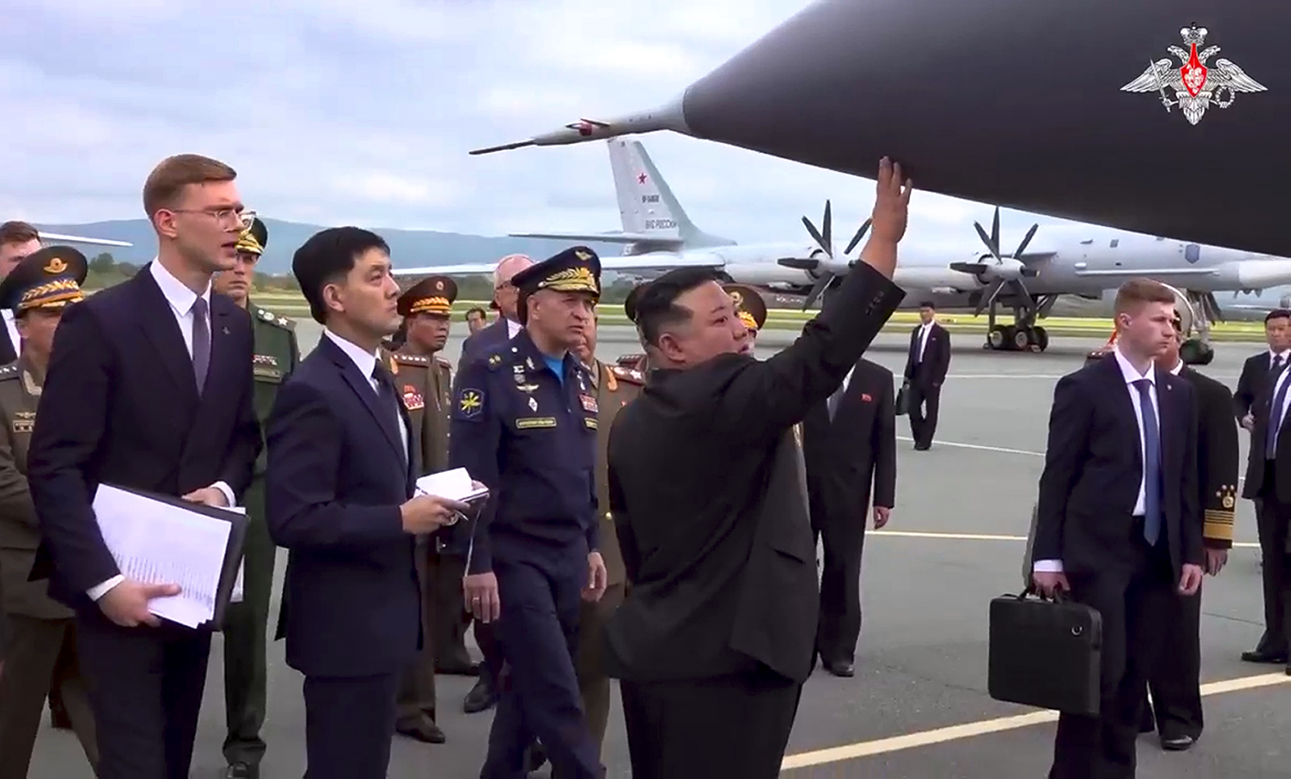 In this image made from video released by Russian Defense Ministry Press Service, North Korea's leader Kim Jong Un, center right, inspects Russian warplanes at the Vladivostok International airport in Vladivostok. Photo / AP