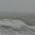 The yacht is partly disabled in rough seas off the entrance to the Kaipara Harbour. Photo / Janna Dixon