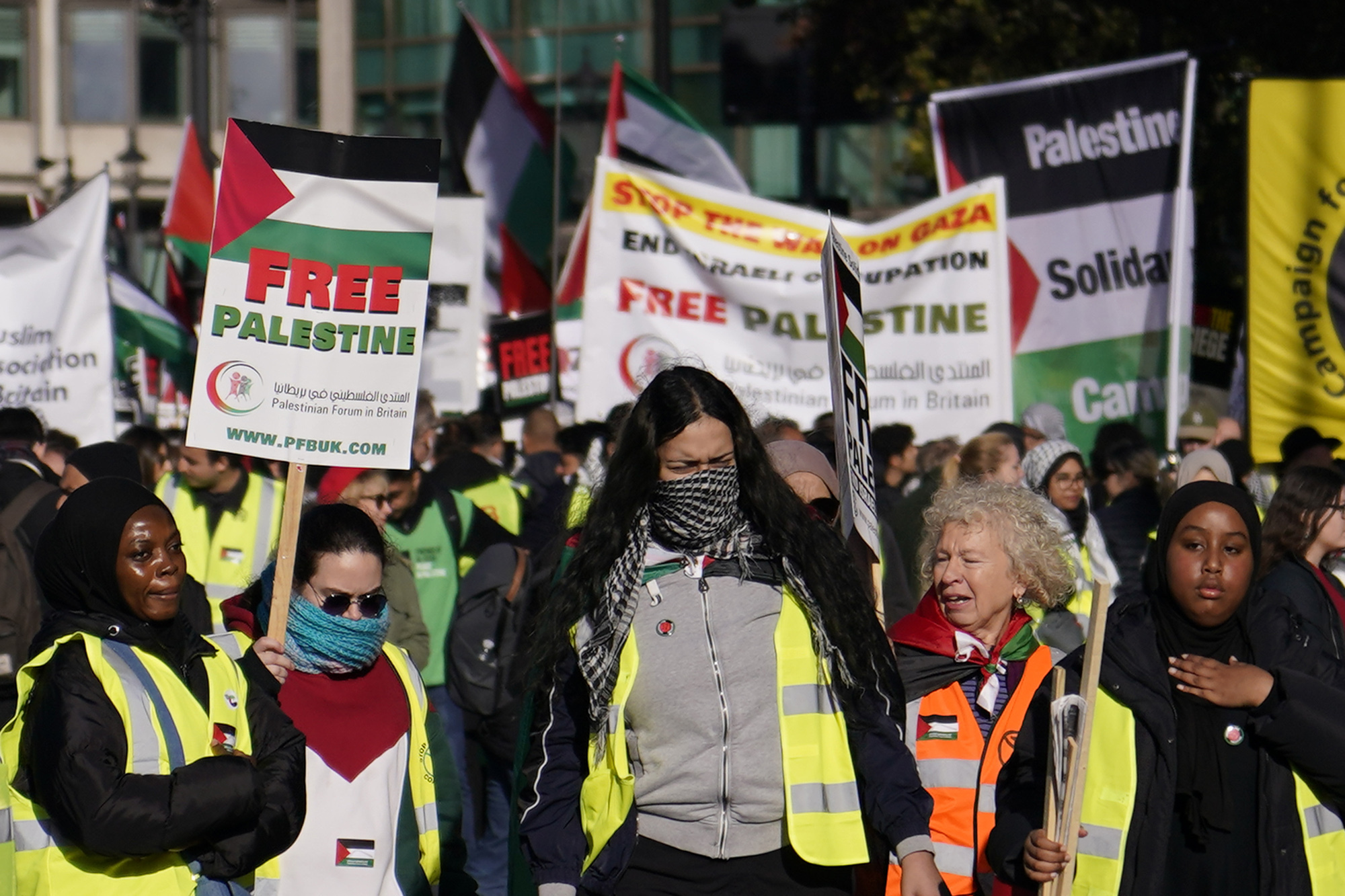 Protesters show placards during a pro-Palestinian protest in London.Photo / AP