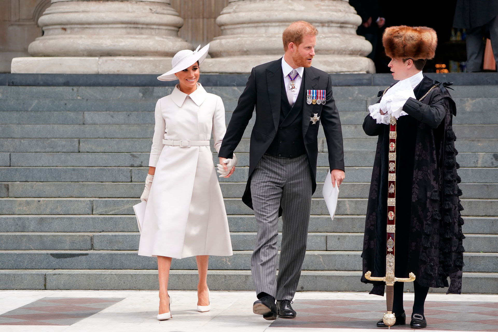 Prince Harry and Meghan, Duchess of Sussex leaves after attending a service of thanksgiving for the reign of Queen Elizabeth II at St Paul's. Photo / AP