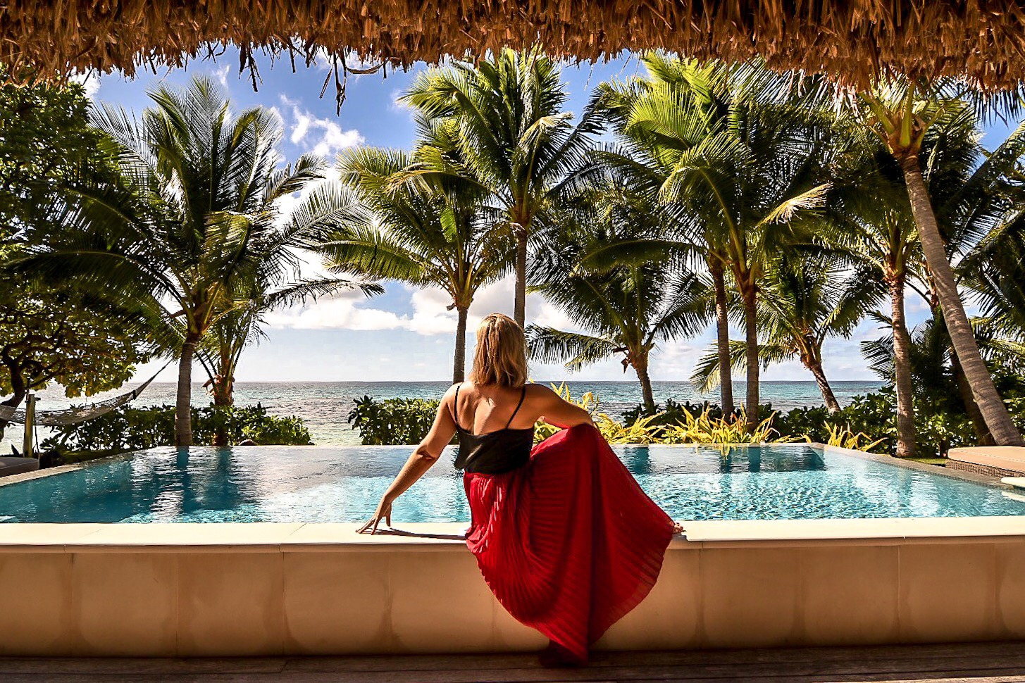 Juliette Sivertsen soaks up the views from her private infinity pool. Photo / Supplied
