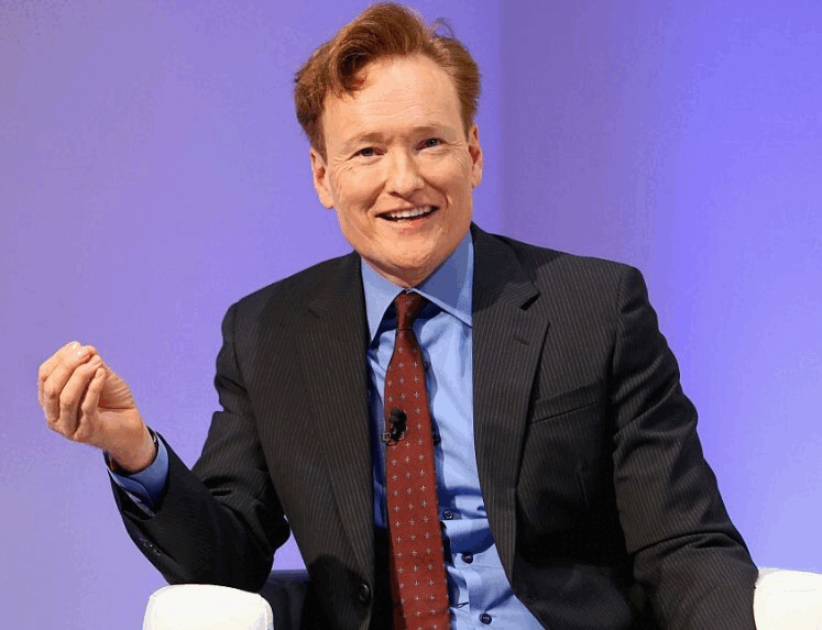 US talk show host and comedian Conan O'Brien; Prime Minister Christopher Luxon with chief press secretary Hamish Rutherford (far left).