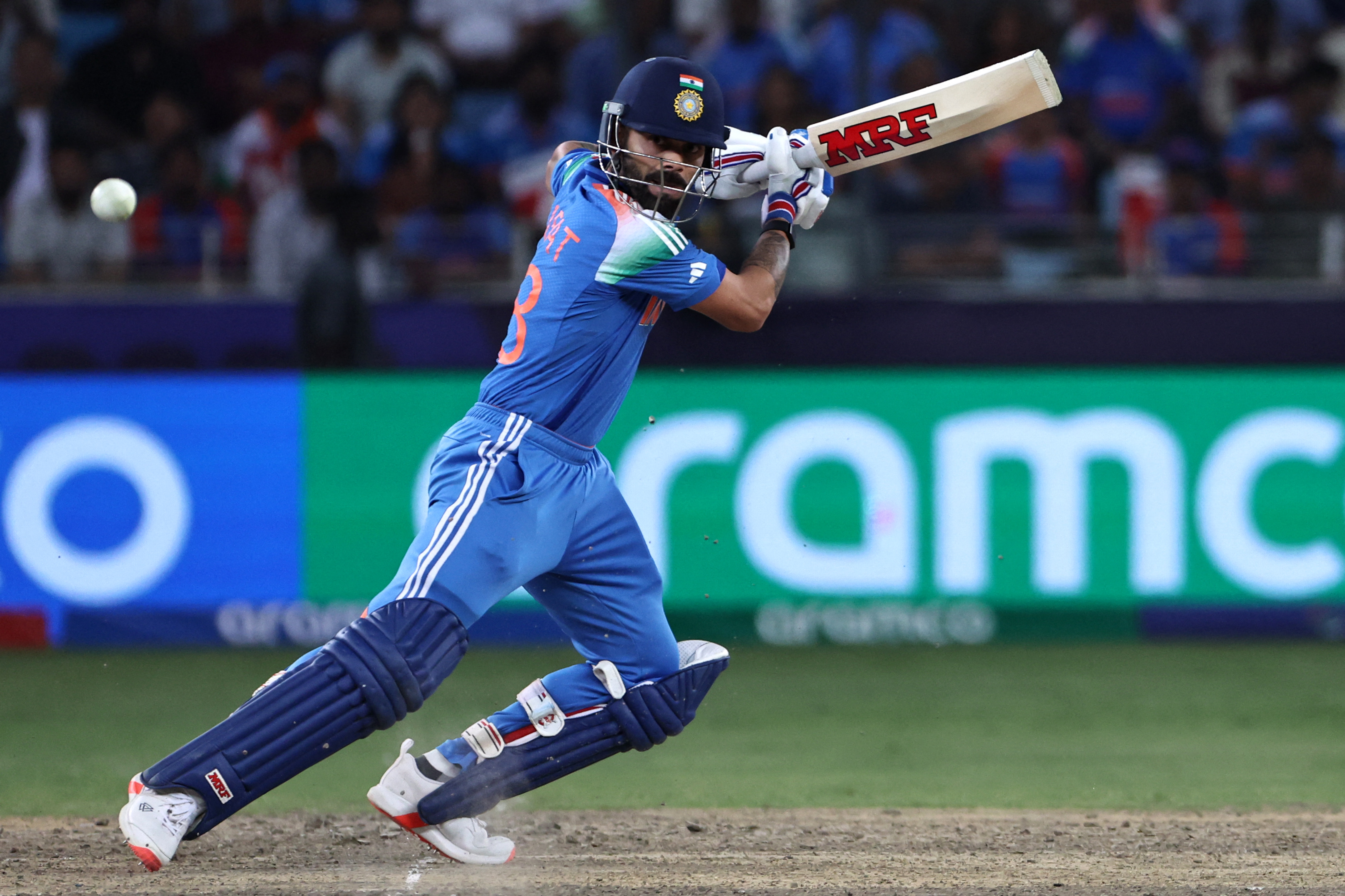 India's Virat Kohli plays a shot during the ICC Champions Trophy one-day international semifinal cricket match between Australia and India. Photo / AFP