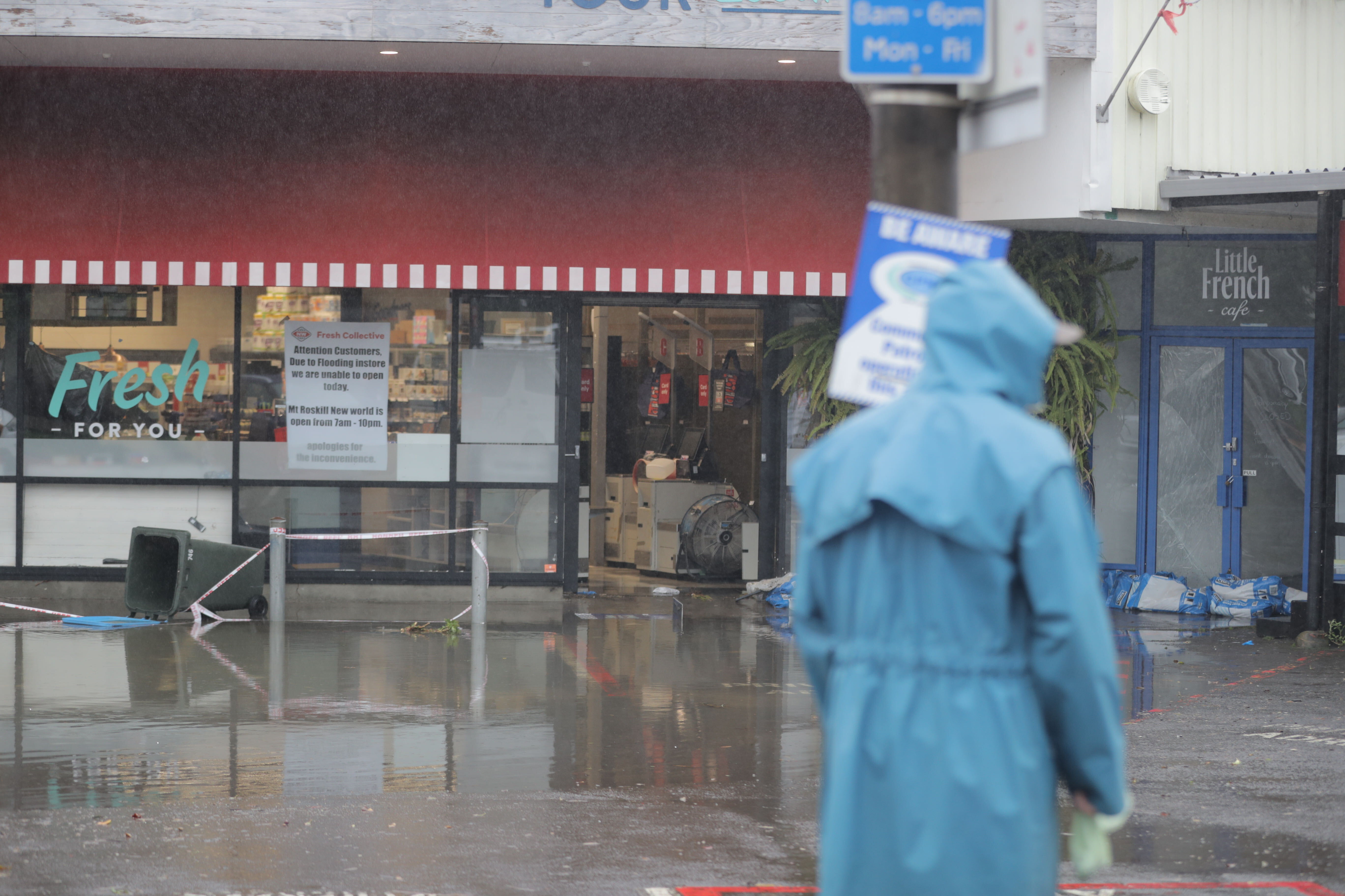 The car park outside the New World Fresh Collective was underwater on Wednesday morning. Photo / Michael Craig