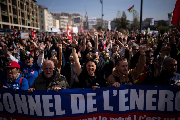 Protesters gather at a demonstration in Marseille, southern France, on Tuesday expressing anger at a bill raising the retirement age to 64. Photo / AP