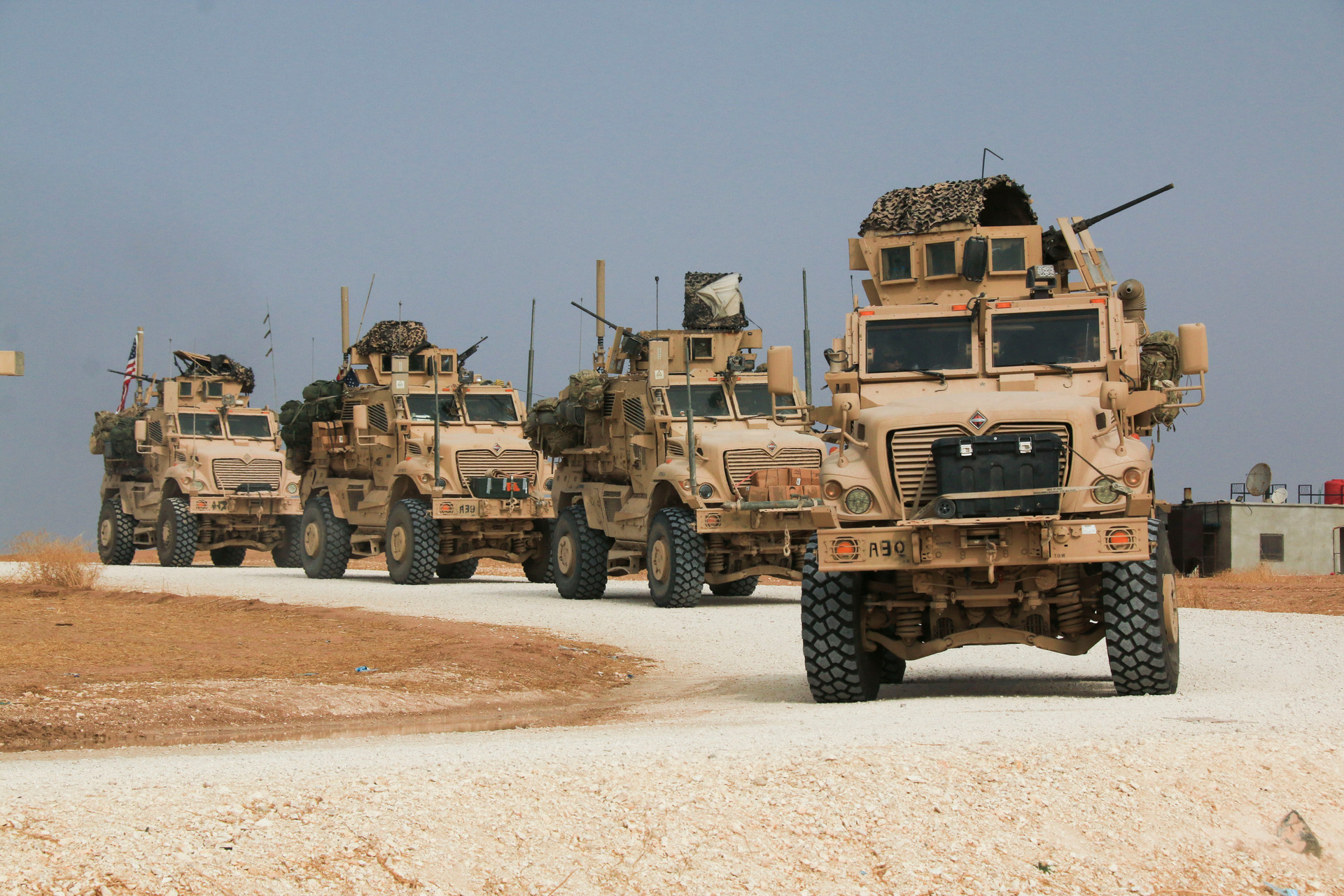 American military convoy stops near the town of Tel Tamr, north Syria. Photo / AP