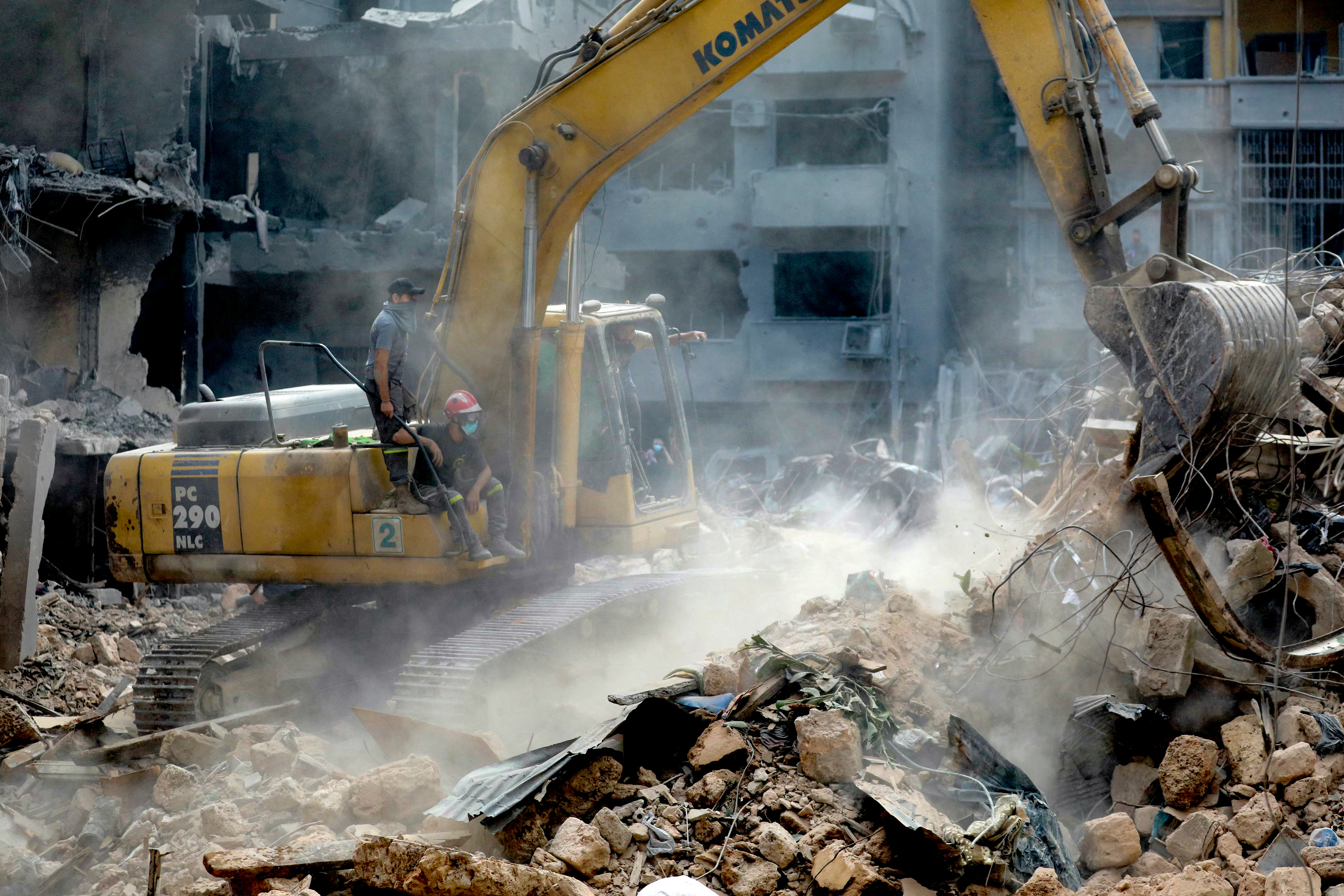 Lebanese civil defence members clear the rubble from the site of an Israeli airstrike in Beirut on October 12, 2024. Photo / Ibrahim Amro, AFP