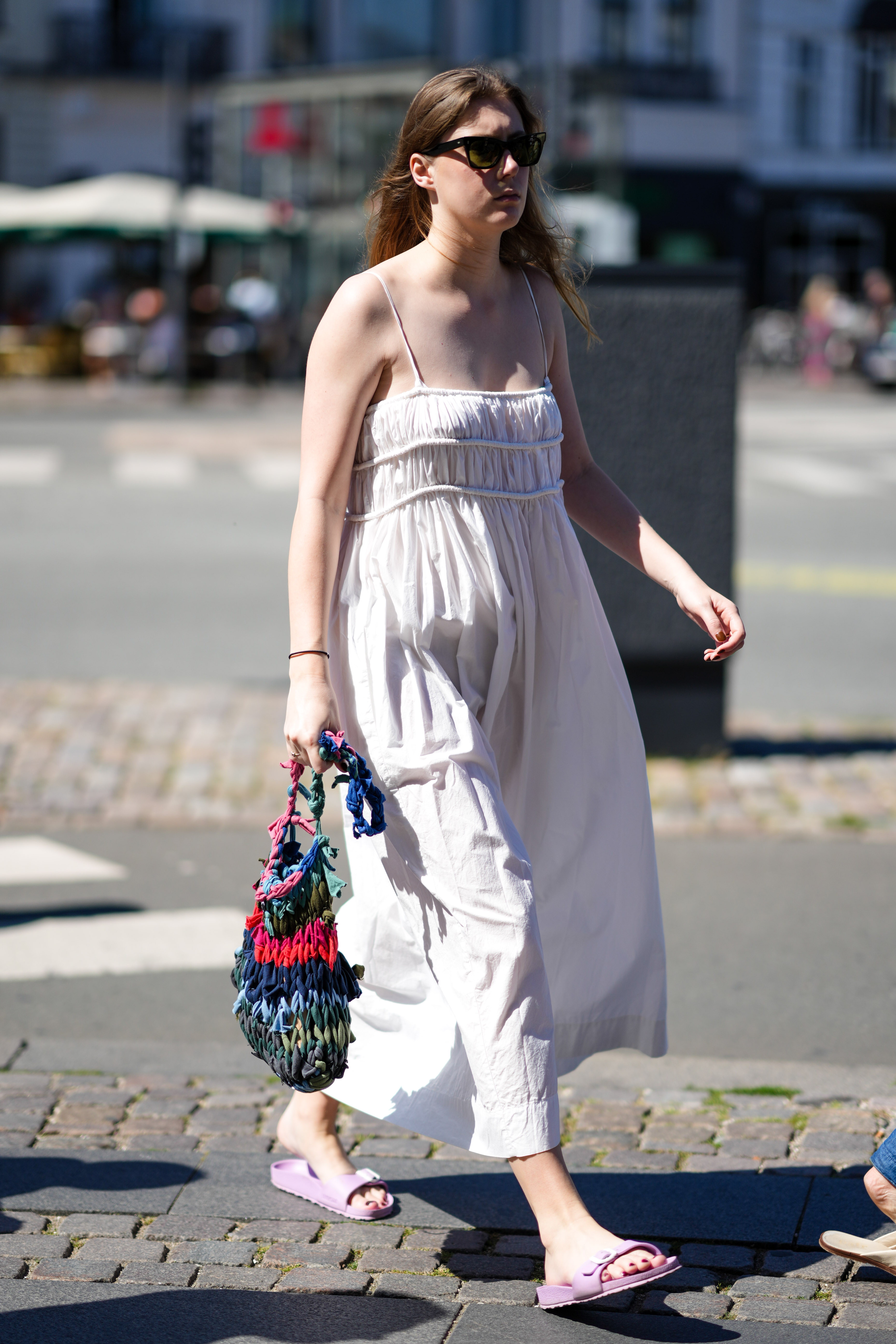 A guest at Copenhagen Fashion Week S/S 2023 wears Birkenstock Madrid sandals. Photo / Getty Images