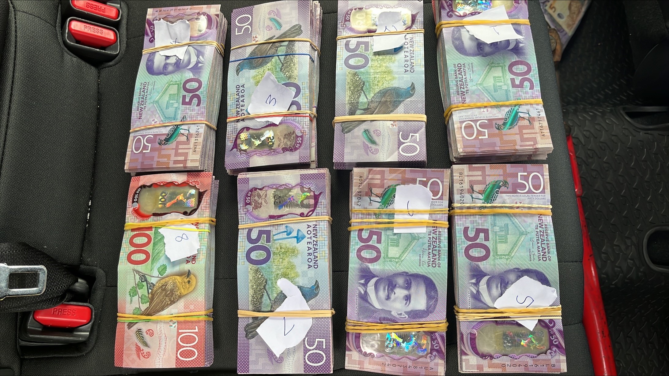 Some of the cash that was seized during the bust. Photo / NZ Police