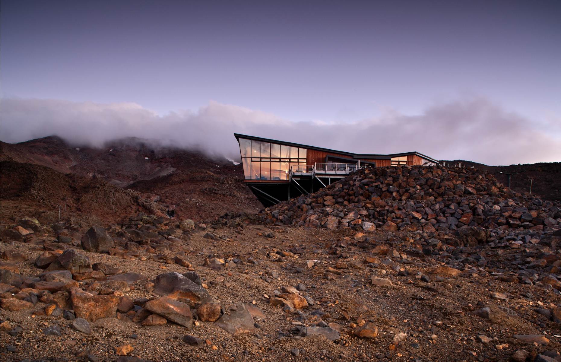Dine in New Zealand's highest restaurant at Knoll Ridge Chalet, a futuristic glass box perched 2,020m above sea level on Mount Ruapehu. Photo / Mt Ruapehu via Facebook