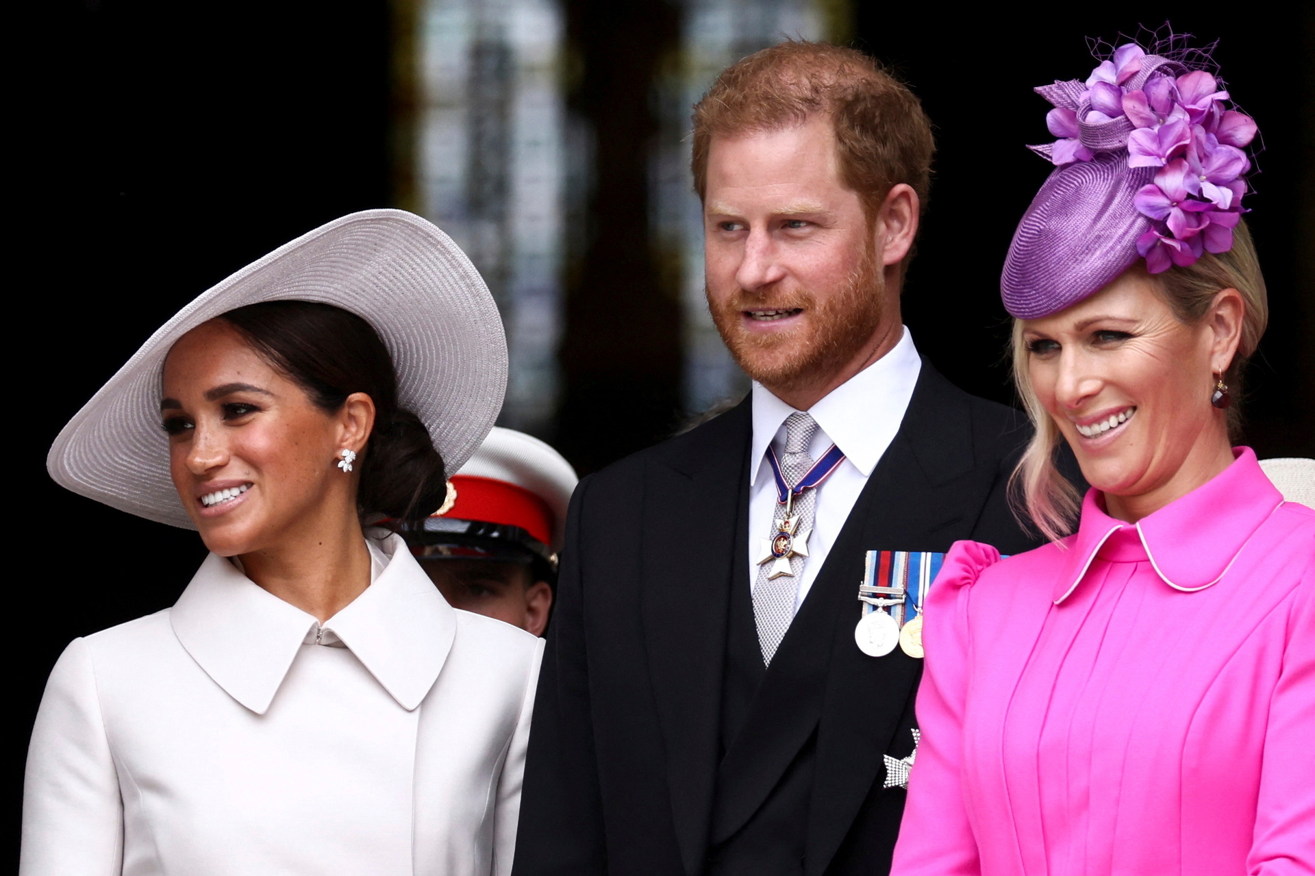 Prince Harry and Meghan spoke with his cousin Zara Tindall after attending a service of thanksgiving. Photo / AP