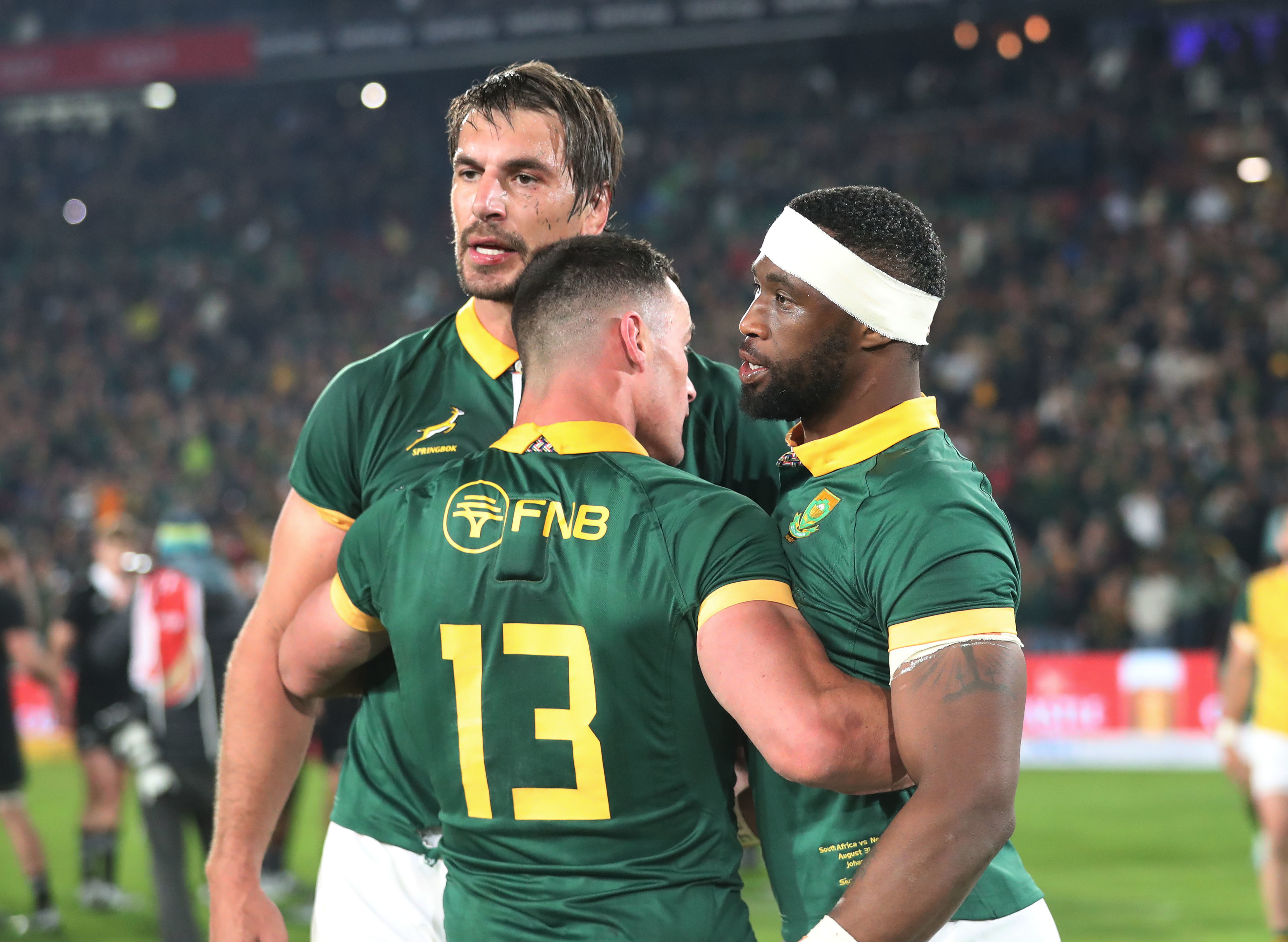 Siya Kolisi, Eben Etzebeth and Jesse Kriel of South Africa celebrate victory over the All Blacks. Photo / Photosport