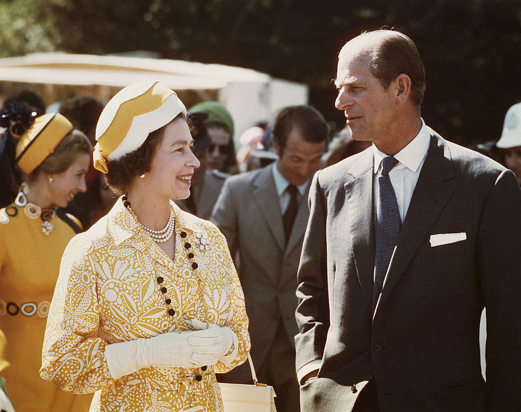 Queen Elizabeth II and Prince Philip in New Zealand during their Commonwealth Tour, 1974. Behind them are Princess Anne and her husband Mark Phillips. Photo / Getty Images