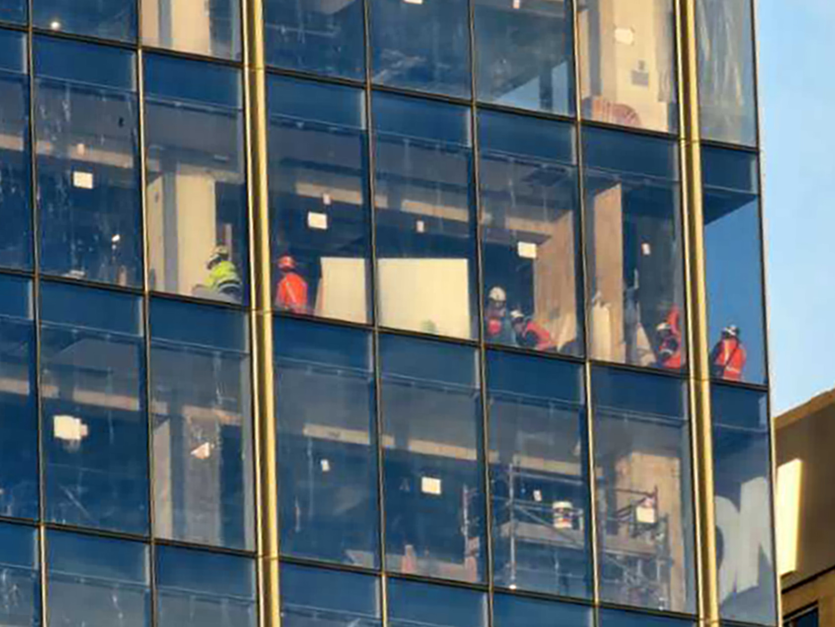 Construction workers took shelter in a corner of the building during the shooting. 