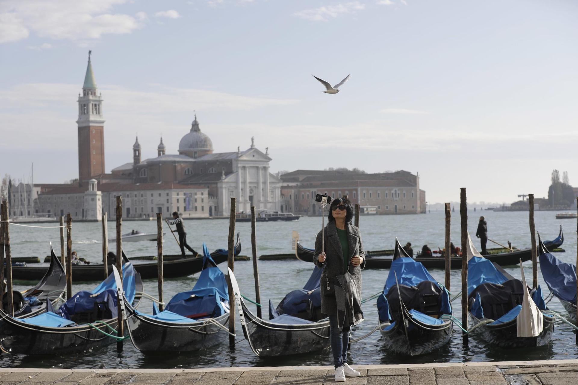 Venice officials on Friday unveiled new rules for day-trippers, which go into effect in January. Photo / Luca Bruno, AP