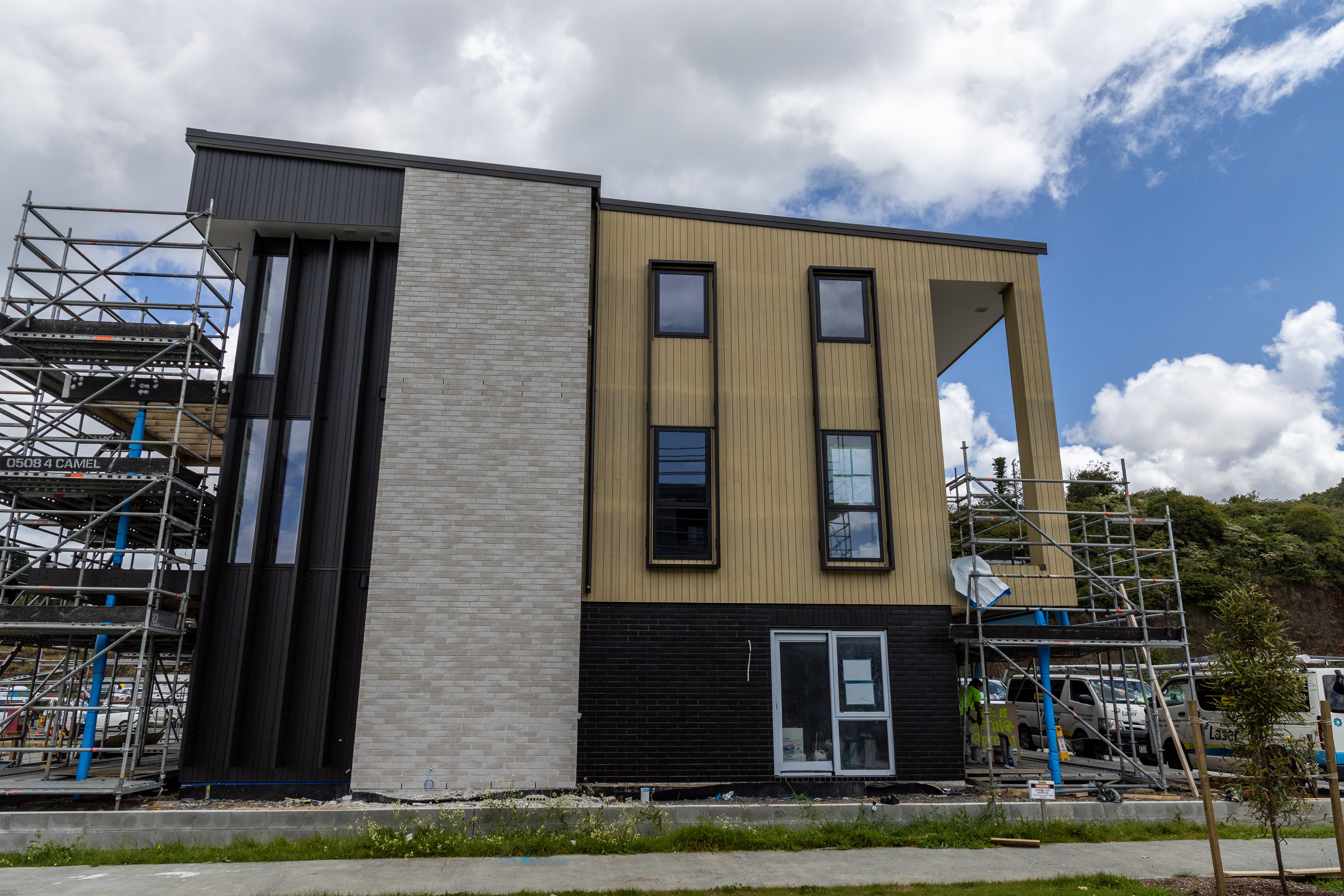 New three-level terrace homes are being built by Fletcher Living in the ex-Winstone quarry at Three Kings. Photo / Michael Craig