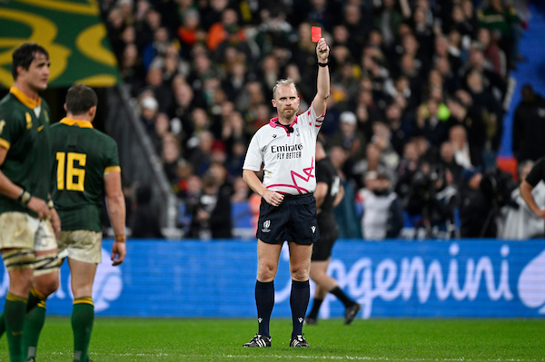 Referee Wayne Barnes raises a red card to Sam Cane. Photo / Photosport