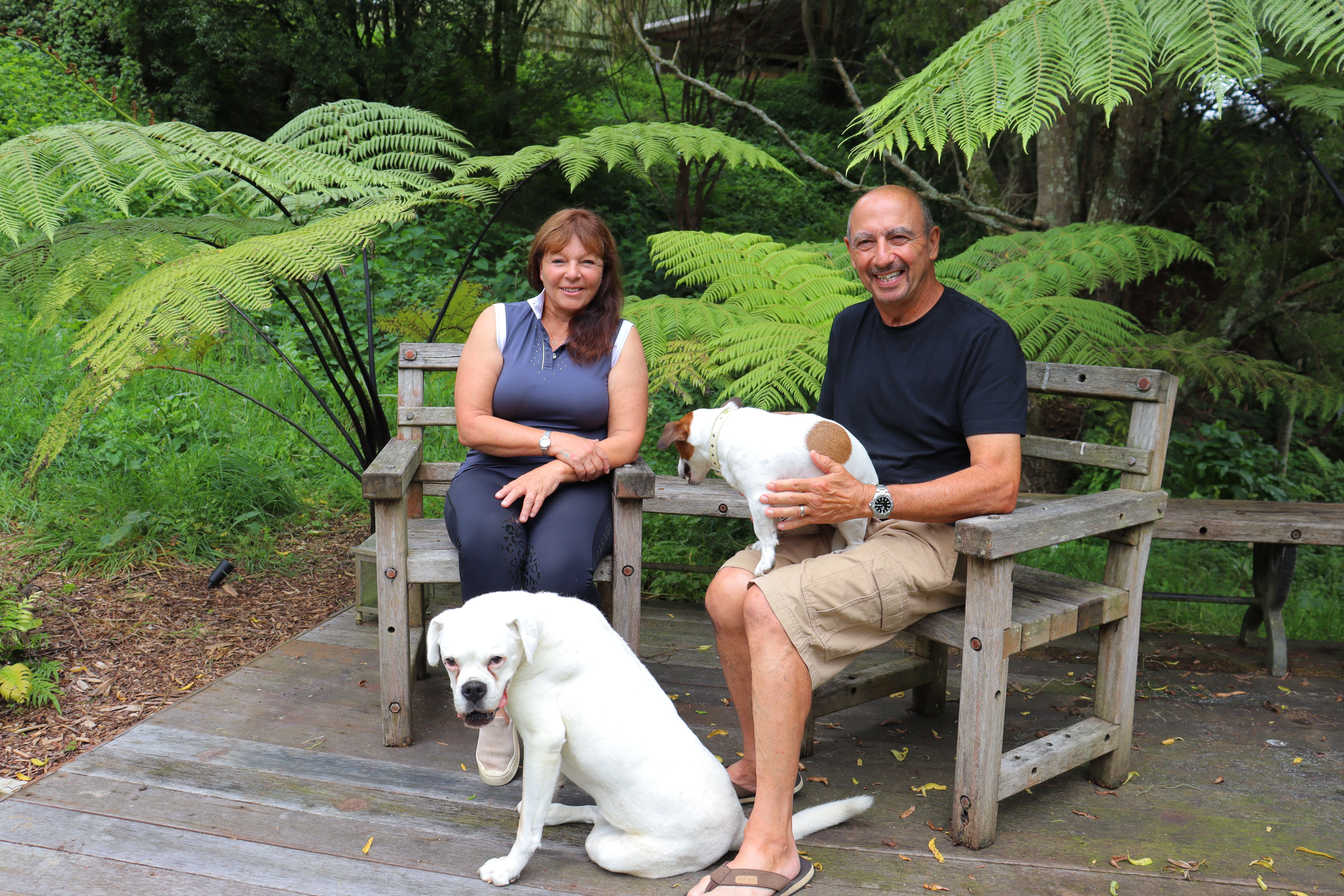 Alma and Charlie Abrahams and two of their dogs Bella and Milo. Photo / Kate Durie