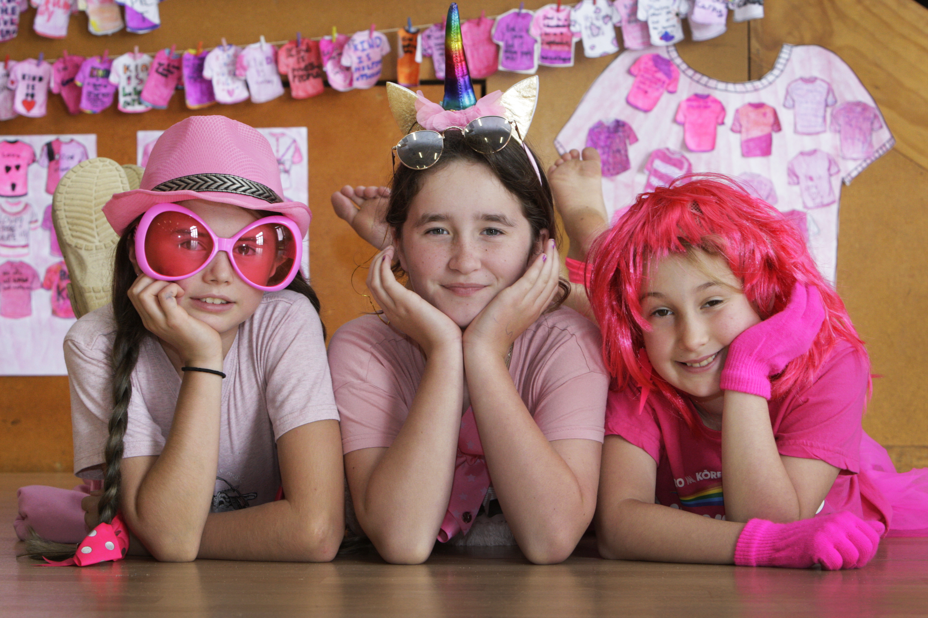 Hurupaki School pupils Grace Fitchett, Ayla Raynel and Evie Coates rocking the colour pink. Photo / Tania Whyte