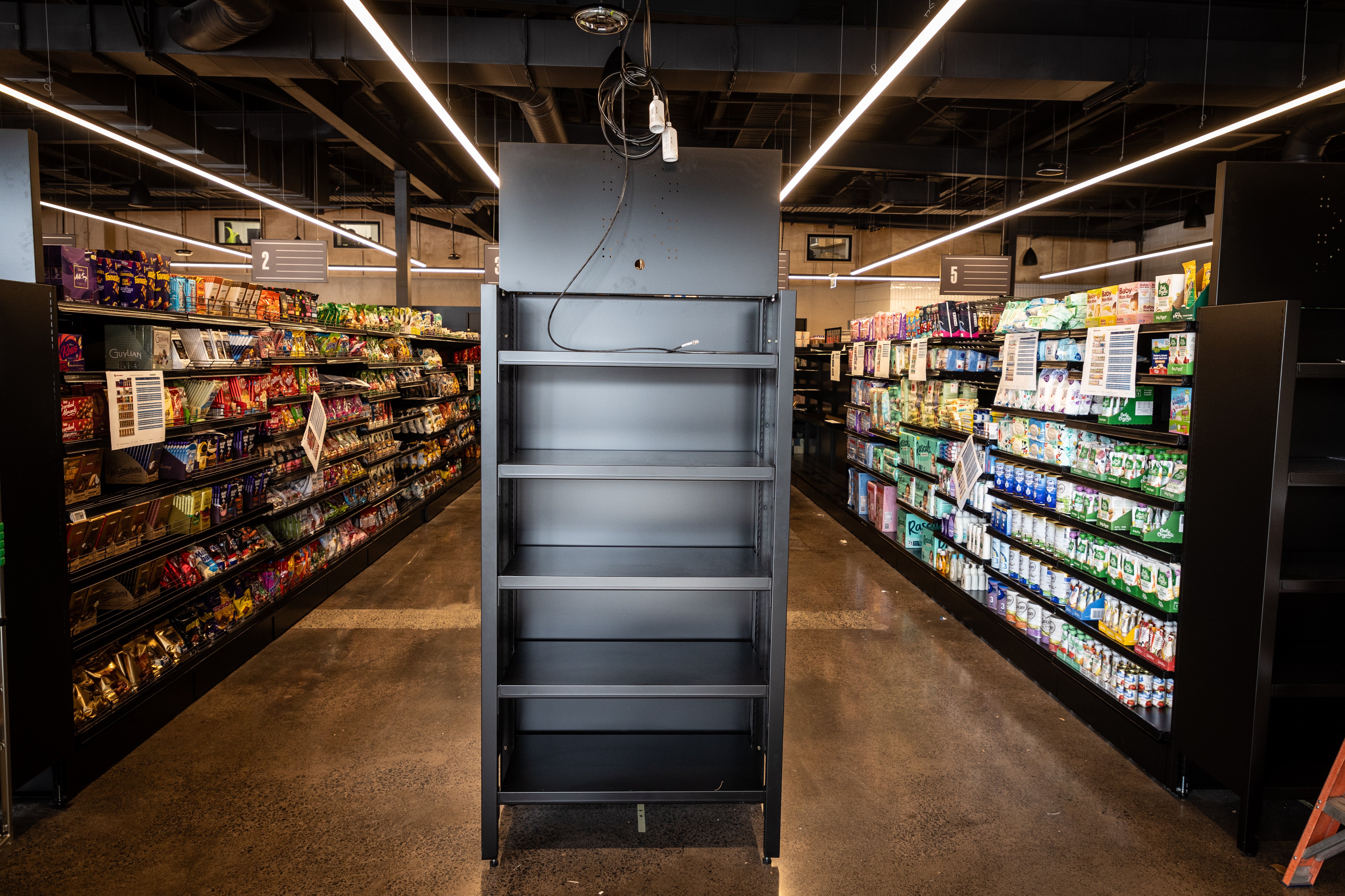 Dark ceilings, polished concrete floor and no more lino: inside New World Mt Albert, which opens on October 8. Photo / Michael Craig