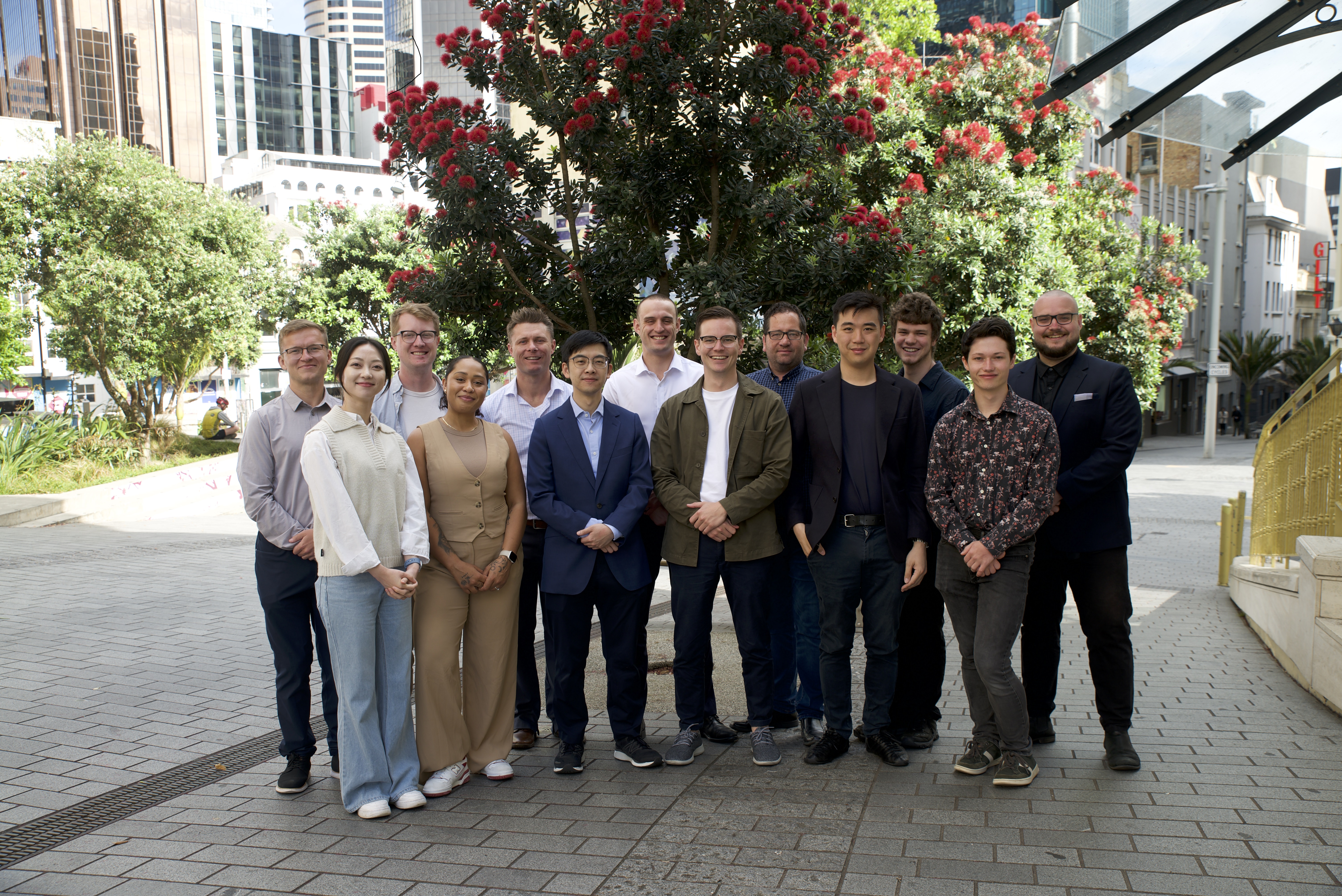 The team at the less than year-old Watchful. Founder Joshua Parsons (centre) says he's non-technical but has employeed young engineers who can automate AI solutions for the gaps he's spotted in the surveillance market.