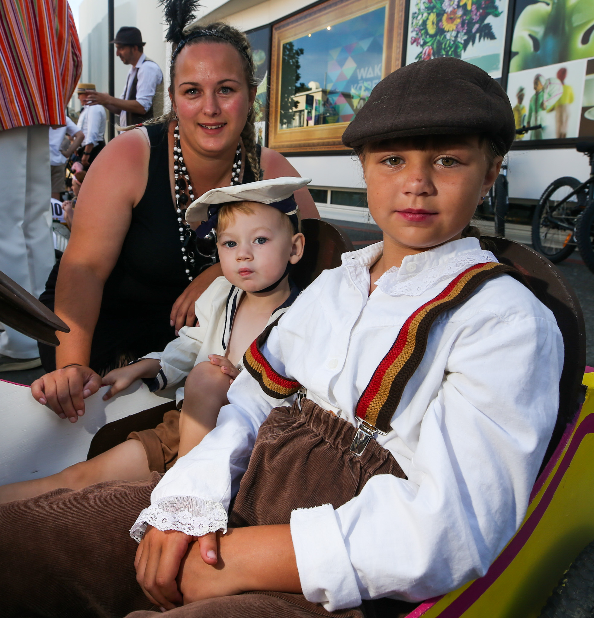 Stephanie Boyd with her children Arlo, 2, and Aria, 9, ahead of the soap box derby. Photo / Paul Taylor