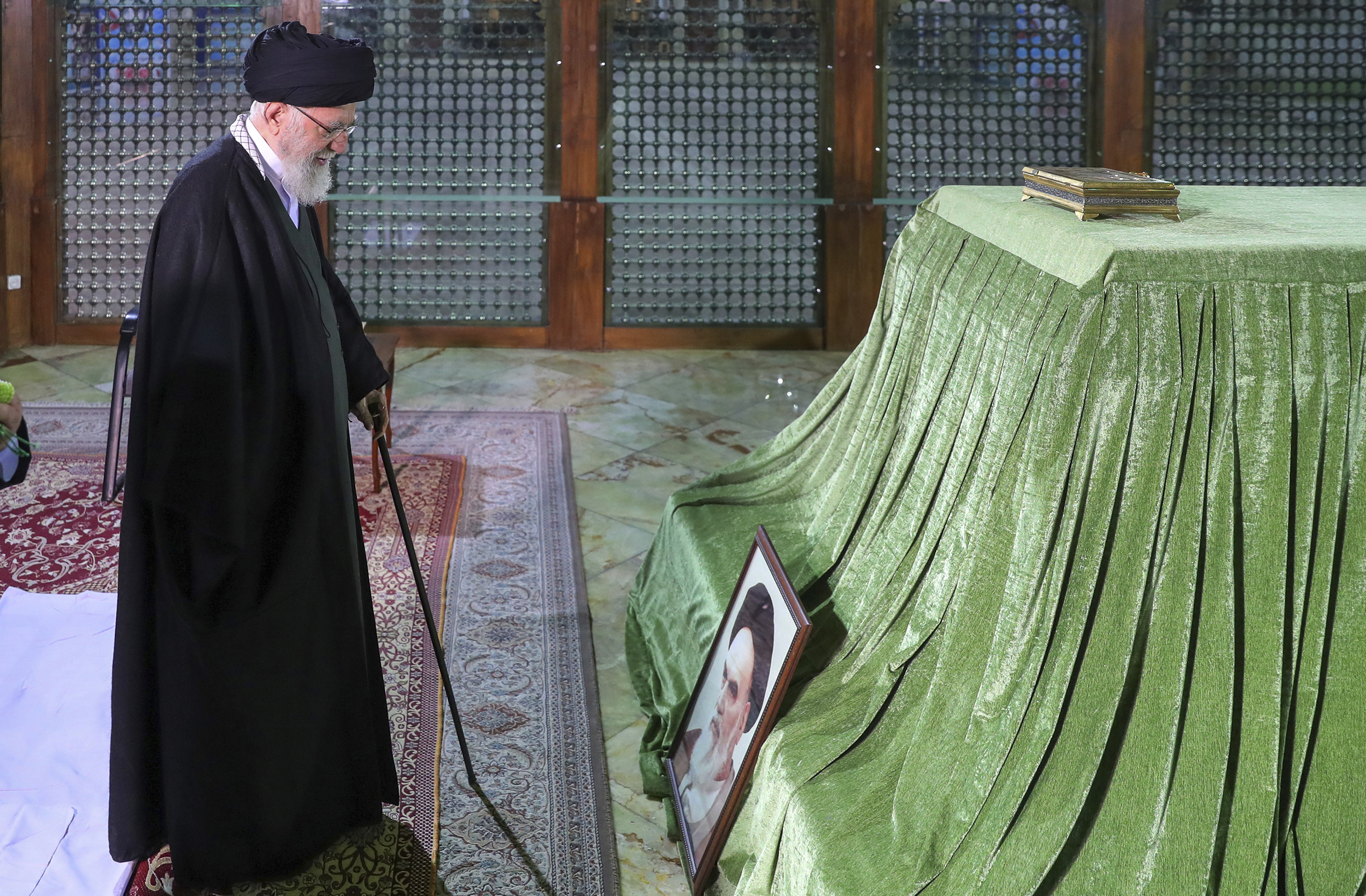Iranian supreme leader, Supreme Leader Ayatollah Ali Khamenei, prays at the grave of the late revolutionary founder Ayatollah Khomeini, just outside Tehran, Iran, on Wednesday. Photo / AP