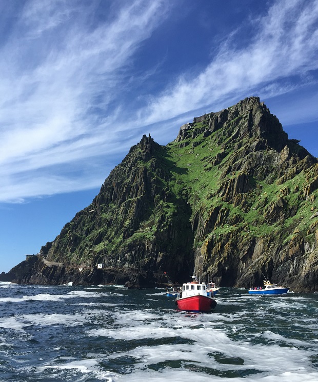 Three of the few boats licensed to take visitors to Skellig Michael. Photo / Getty Images