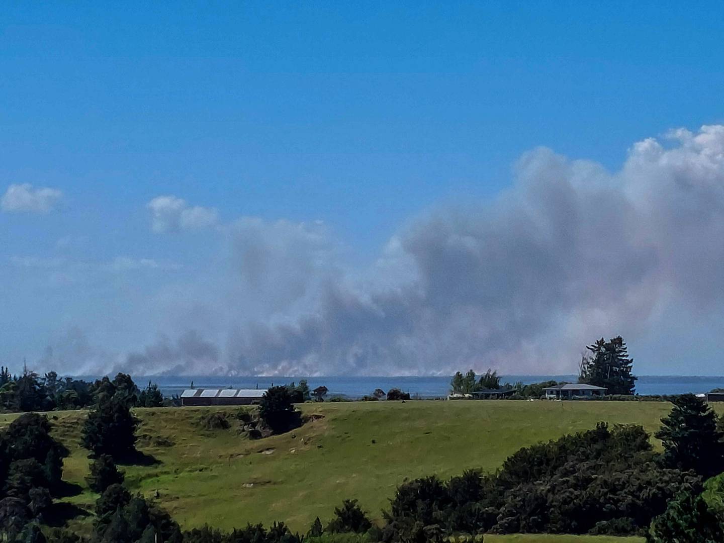 A scrub fire at Waiharara is continuing burn and people in the Far North are reminded to stay away from the beach. Photo / Supplied