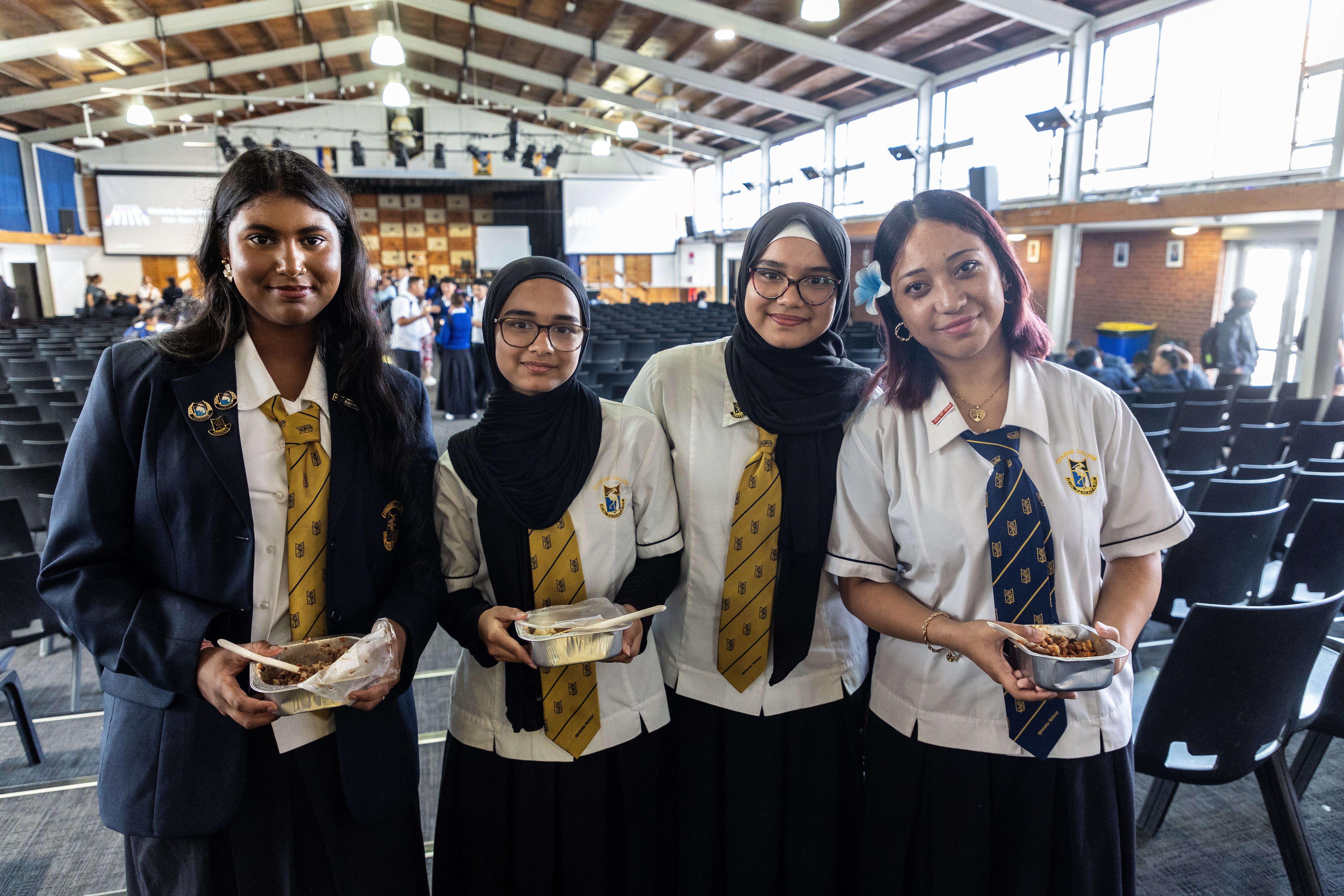 From left, Ōtāhuhu College students Divya Kumar, Afiya Khan, Annam Khan and Heremoko Iakimo, give their verdict on the School Lunch Collective menu. Photo / Michael Craig
