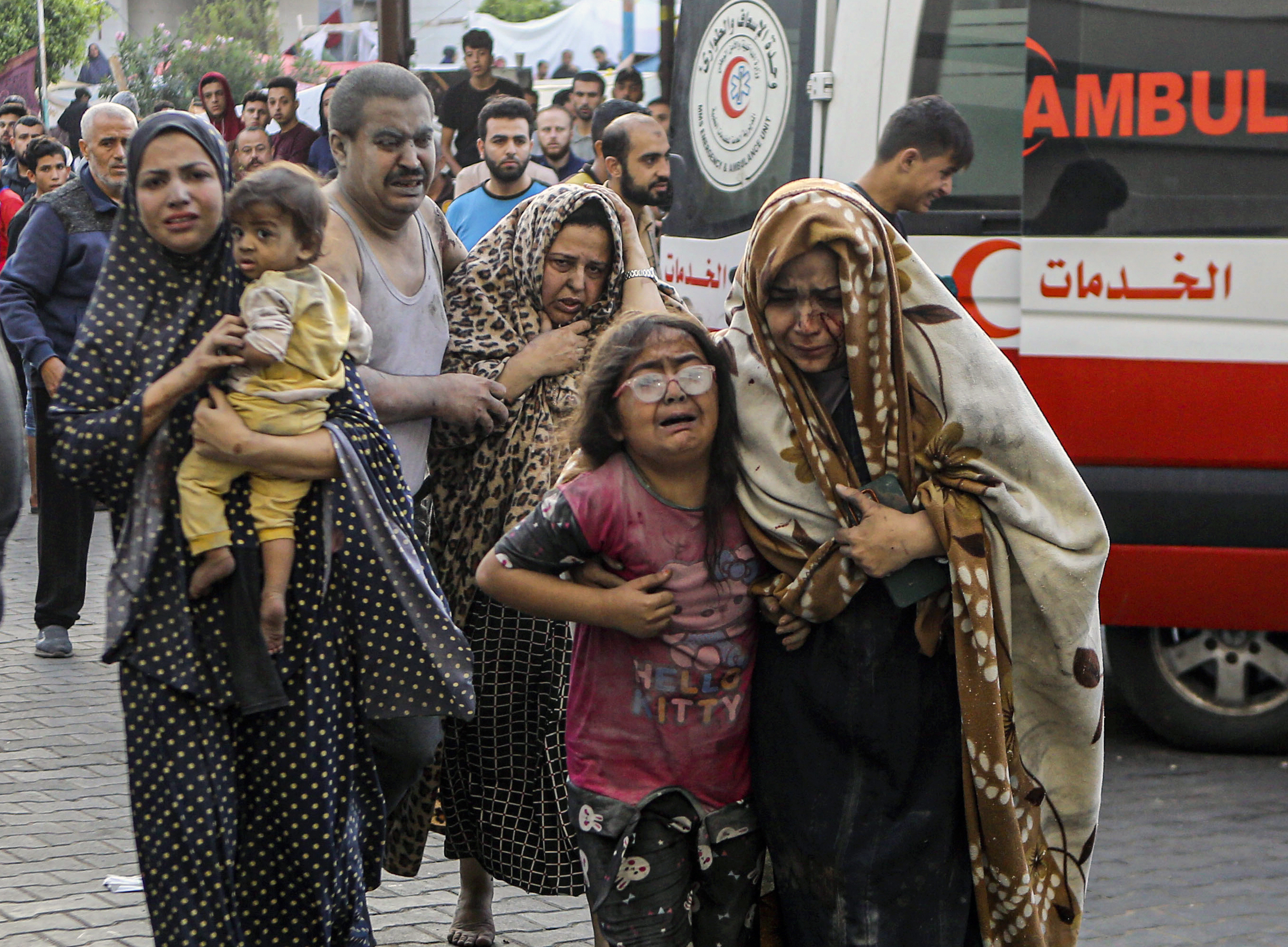 Wounded Palestinians arrive to al-Shifa hospital, following Israeli airstrikes on Gaza City, central Gaza Strip, on Monday. Photo / AP