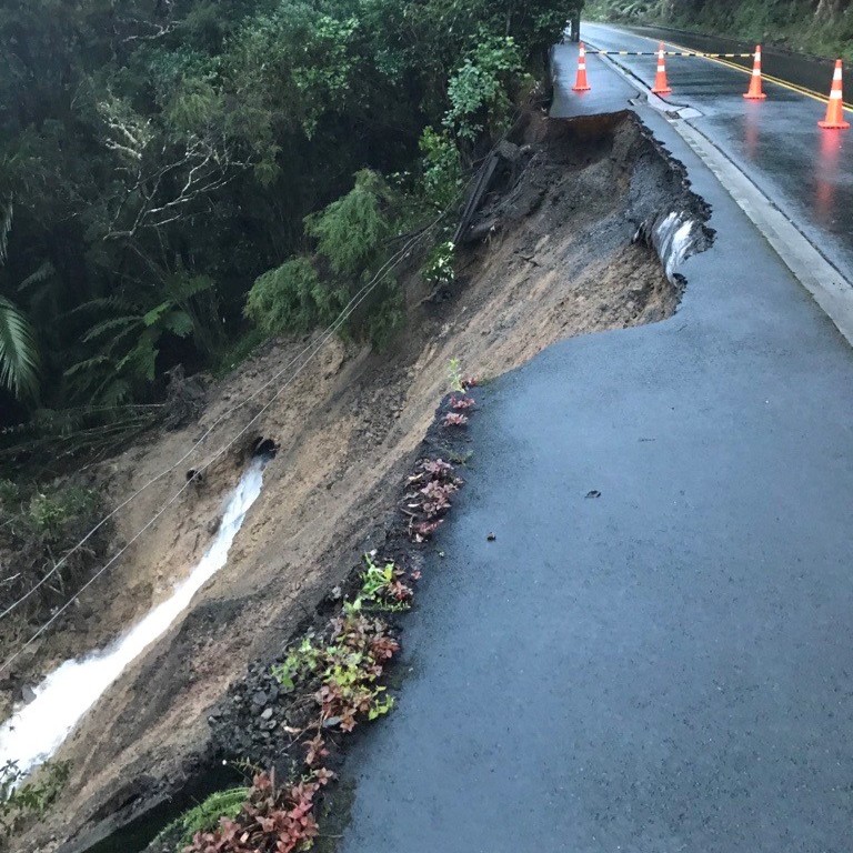 A slip on Scenic Dr that knocked out a water pipe and instantly cut water to 10,000 West Auckland residents. Photo / Watercare
