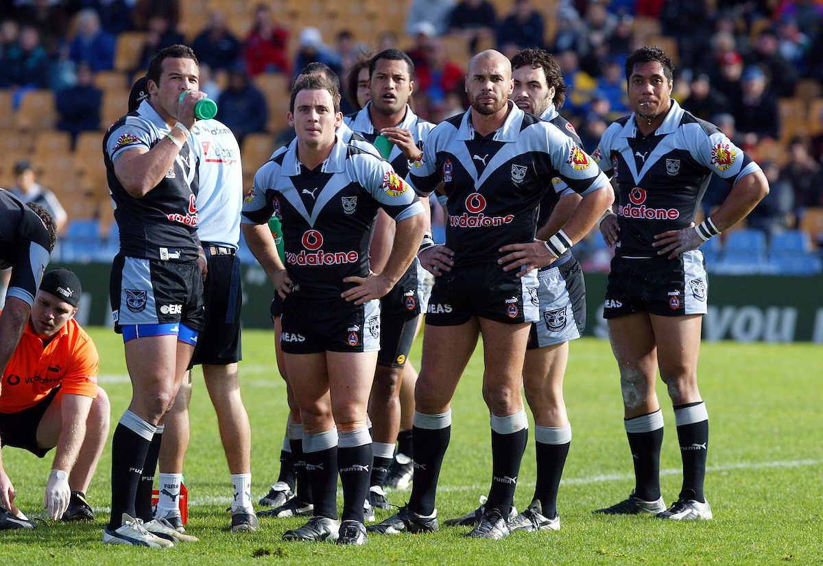 Warriors players wait for a video decision during a 2004 win over the Raiders. Photo / Photosport