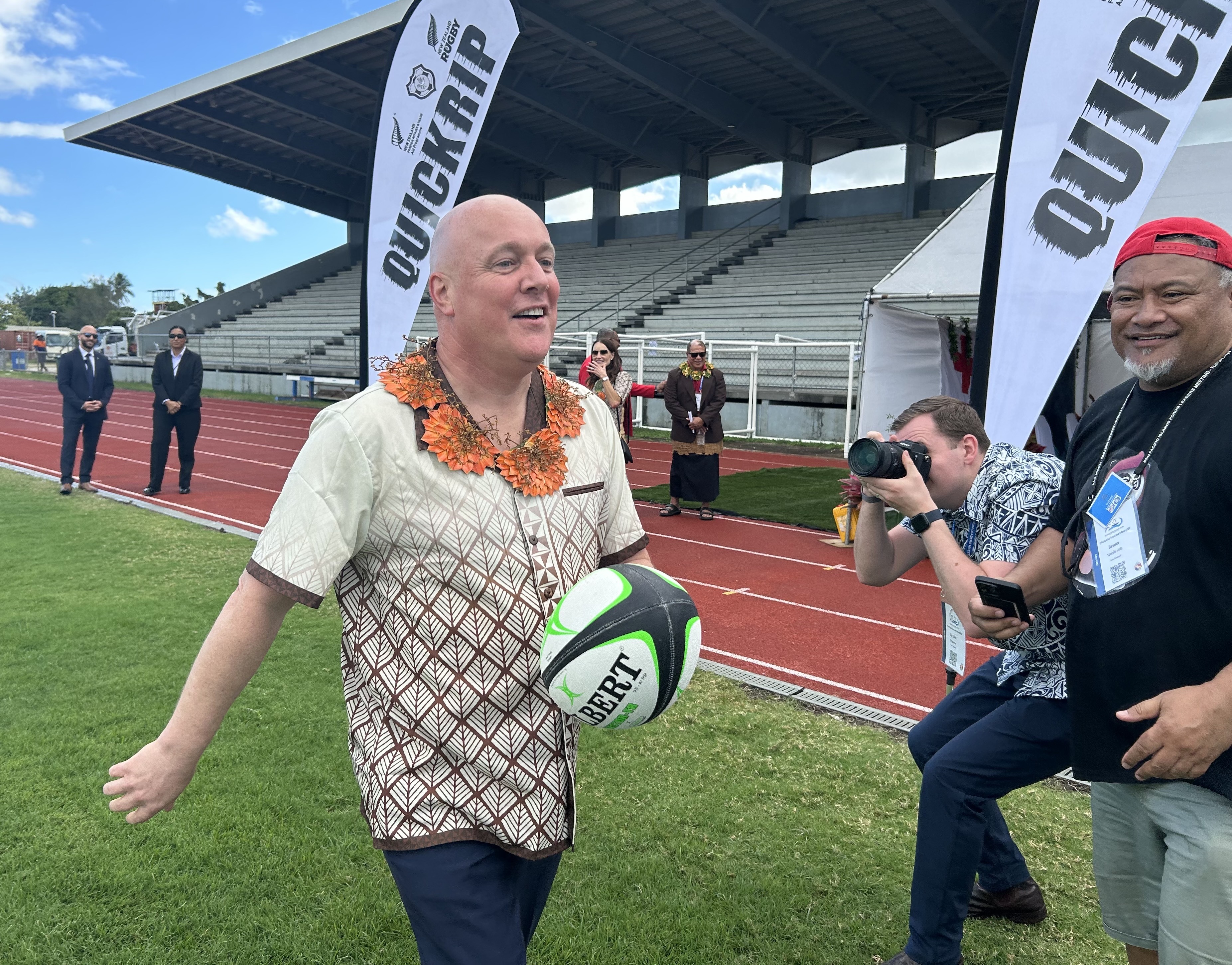 Prime Minister Christopher Luxon taking part in a women's rugby event at a stadium in Nuku'alofa, Tonga while at the Pacific Islands Forum. Photo / Adam Pearse