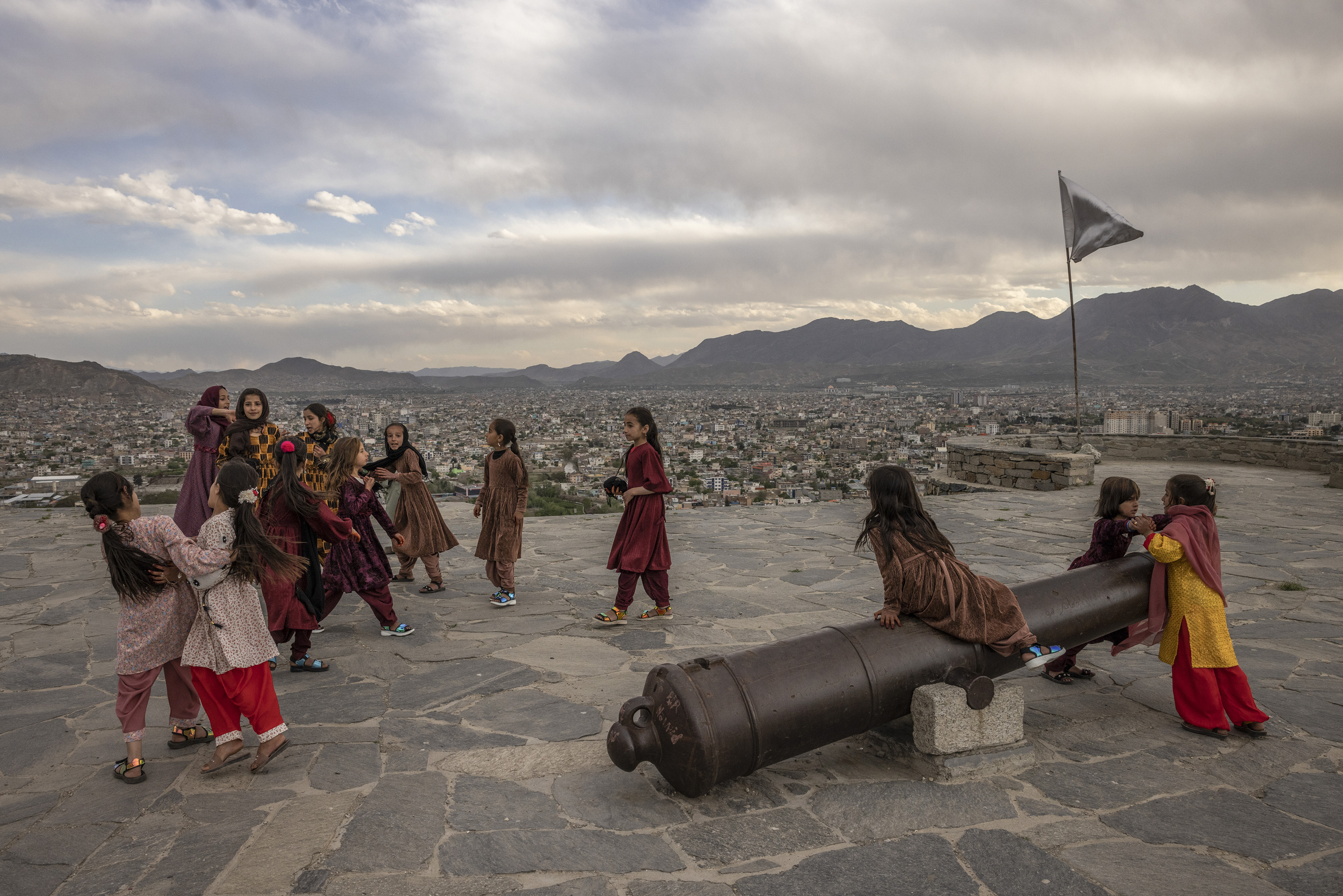 Girls playing on a hillside overlooking Kabul, last year. Photo / Jim Huylebroek, The New York Times