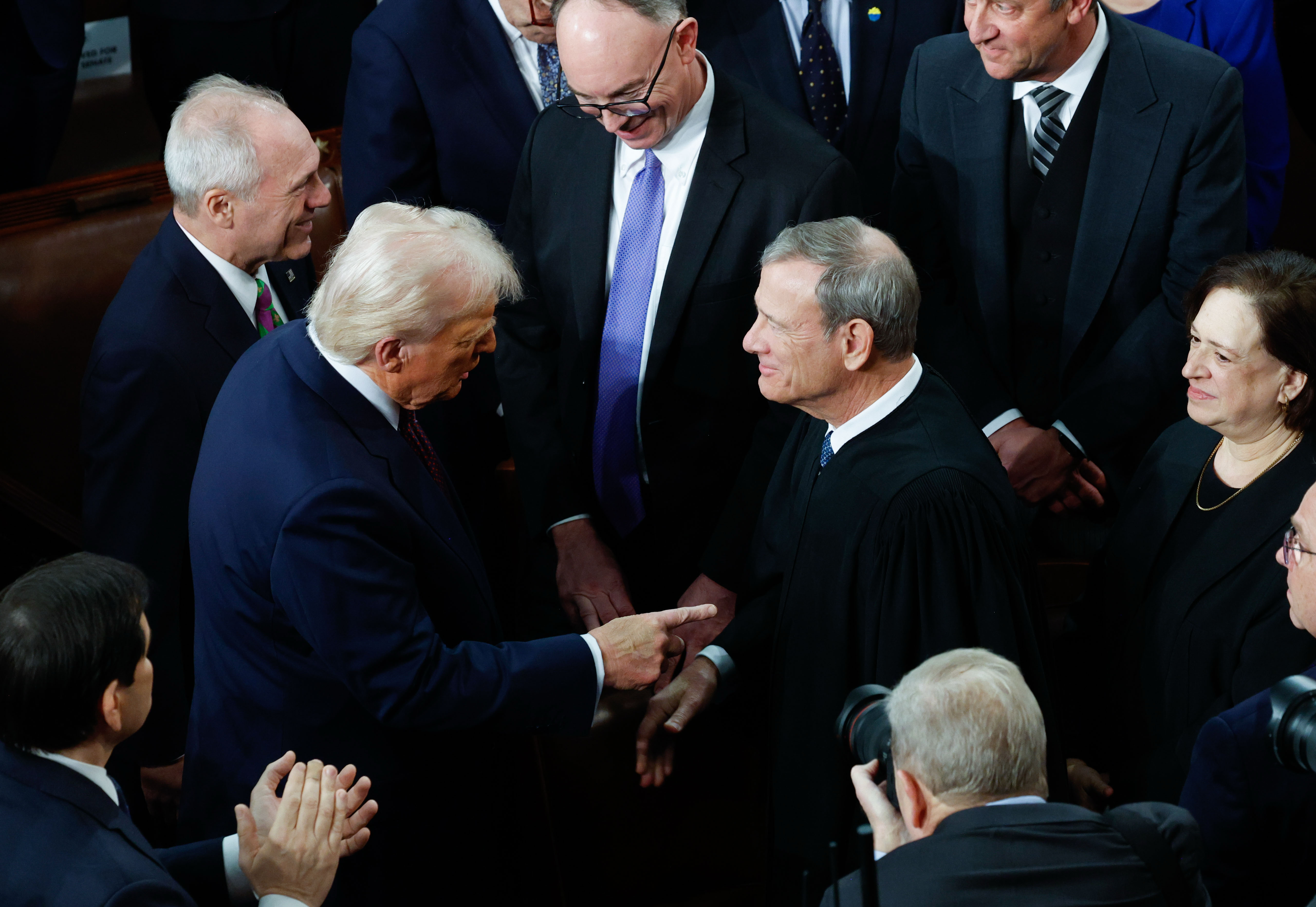US President Donald Trump greets Chief Justice John Roberts before addressing a joint session of Congress on March 4, 2025. Photo / Tom Brenner, The Washington Post