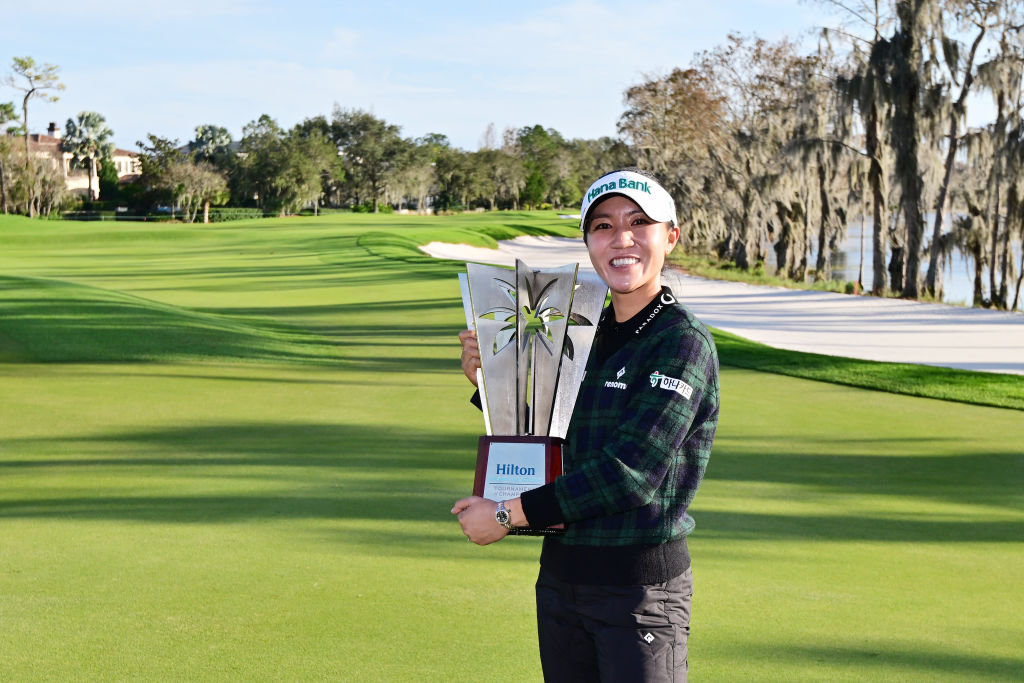 Lydia Ko of New Zealand poses with the trophy after winning the Hilton Grand Vacations Tournament of Champions. Photo / Getty