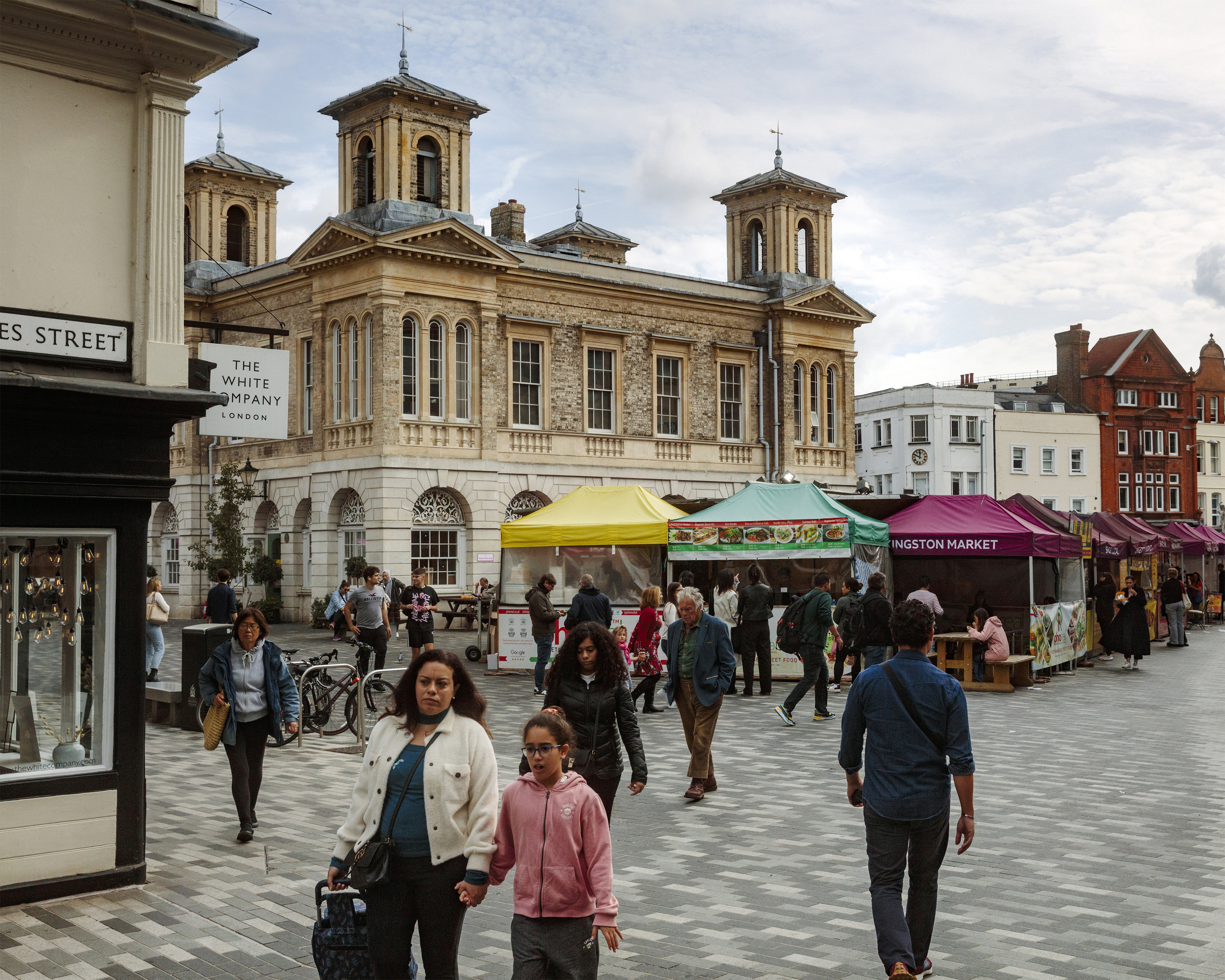 Market stalls in Kingston upon Thames, England. Britons who had already stared down a year of economic and political turmoil met the latest developments with anxiety and concern. Photo / Alex Ingram, The New York Times