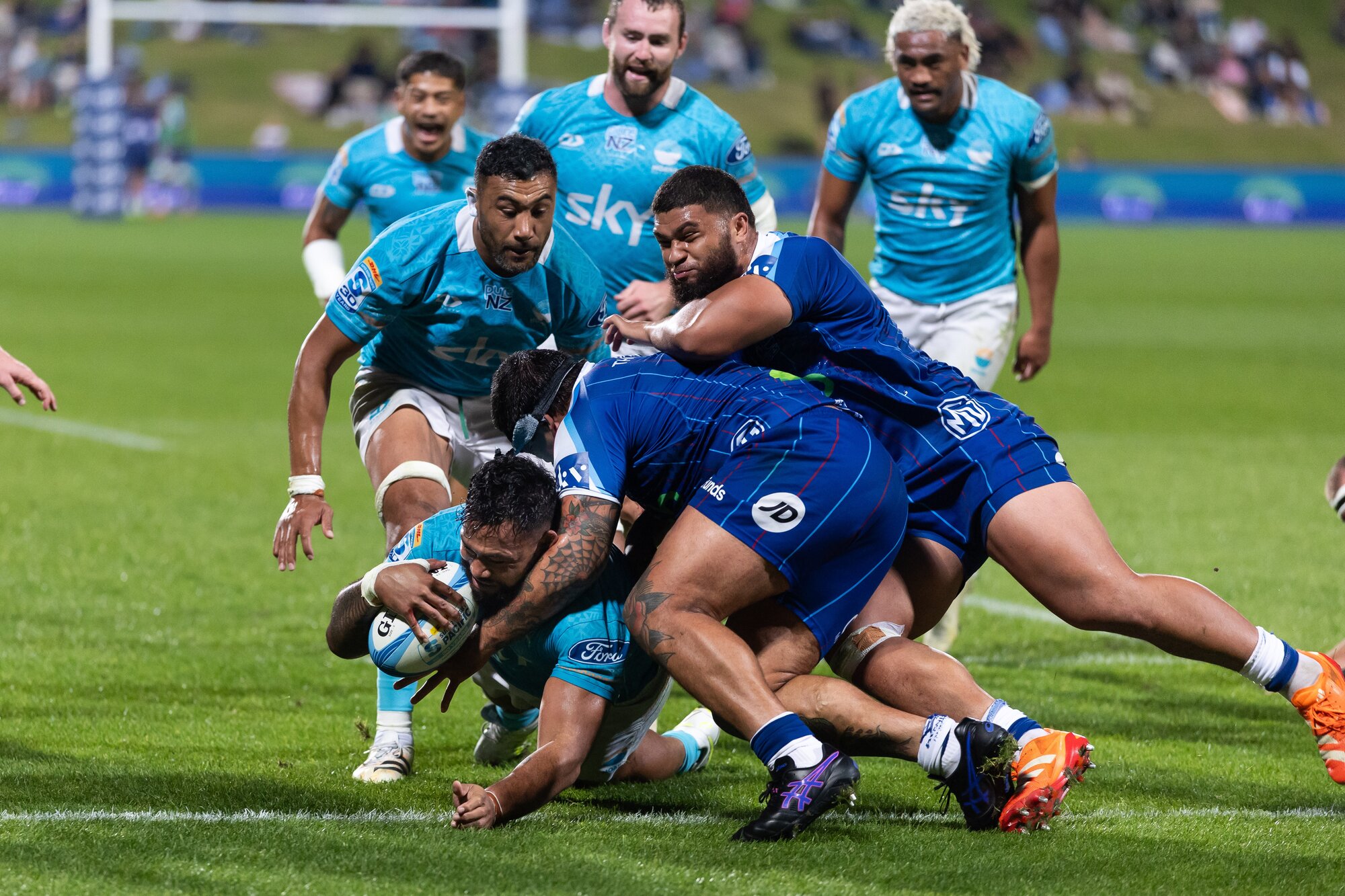 Moana Pasifika's Millennium Sanerivi scores against the Blues in Super Rugby Pacific. Photo / Photosport