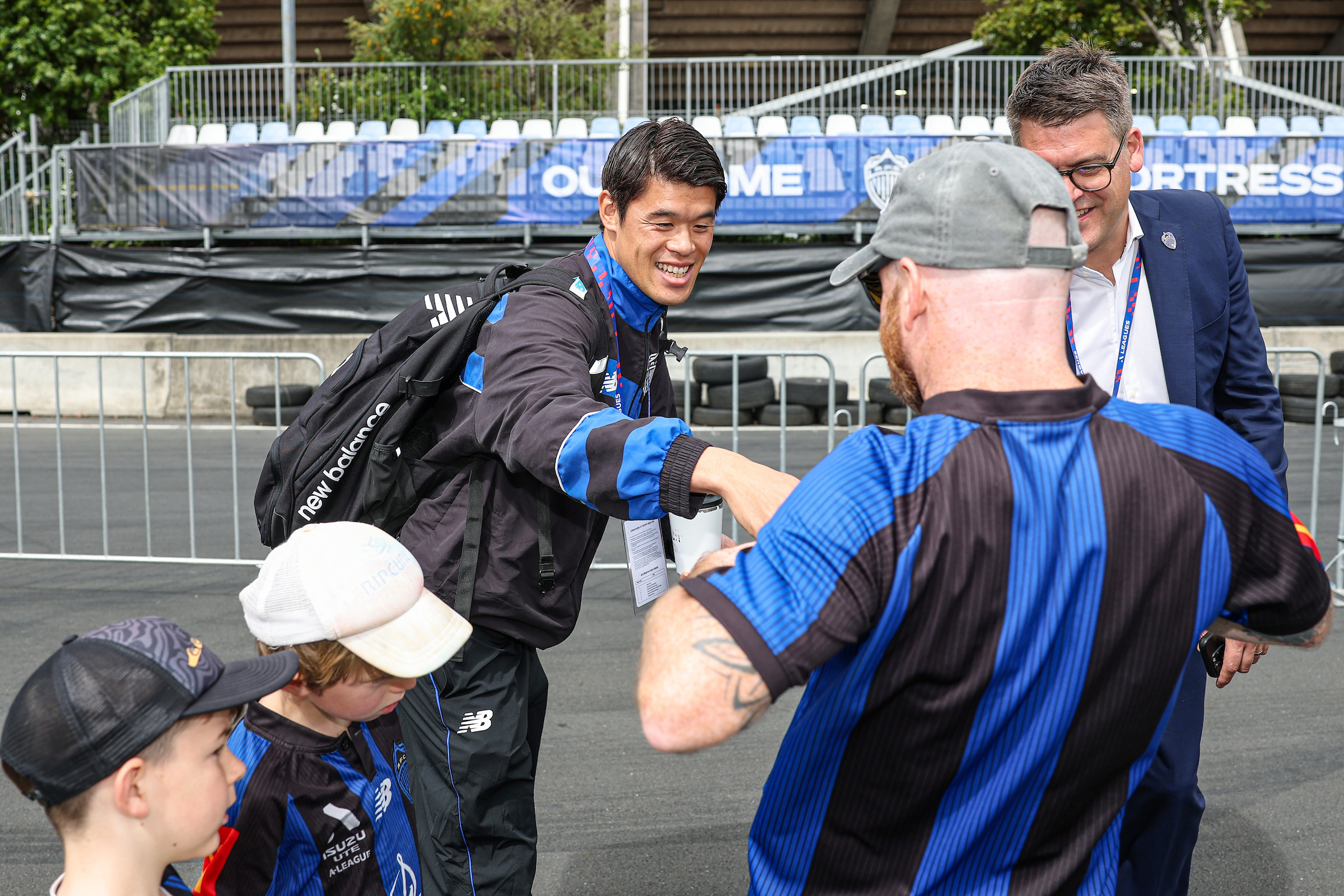 Auckland FC's Hiroki Sakai with fans. Photo / photosport.nz